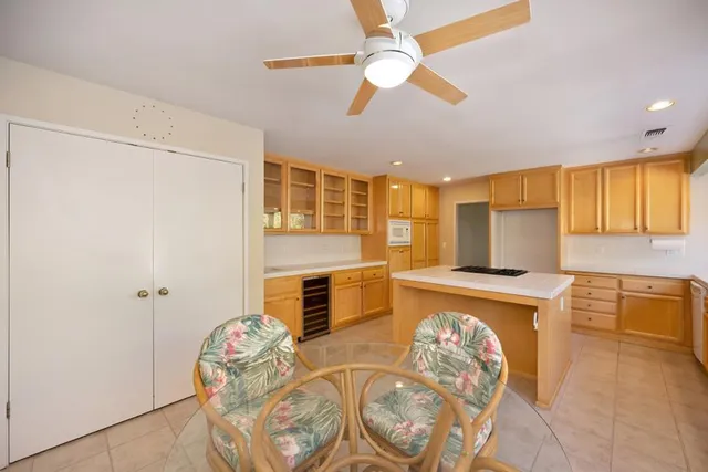 a bathroom with a double vanity sink and mirror with shower