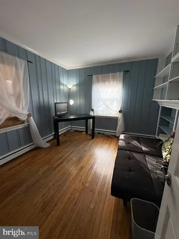 a room with furniture and a window
