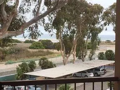 a view of a lake from a balcony