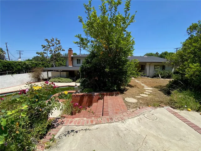 $1,399,000 | 5323 Del Moreno Drive, Woodland Hills, CA 91364