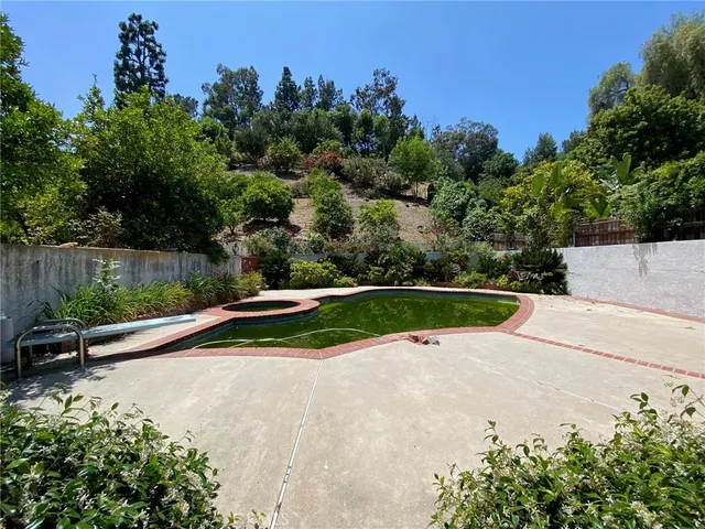 $1,399,000 | 5323 Del Moreno Drive, Woodland Hills, CA 91364