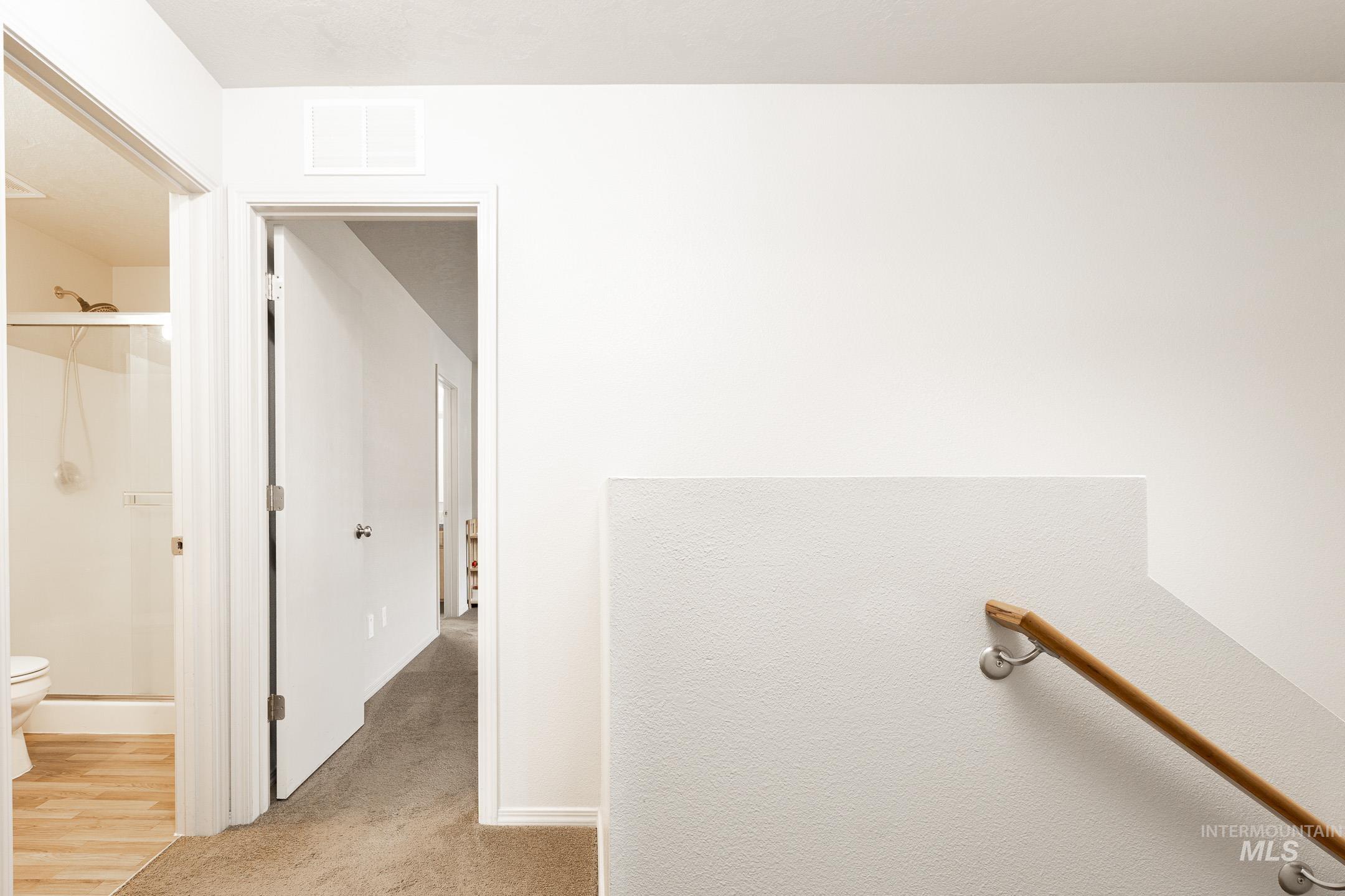 643 North Manship Avenue Meridian, ID 83642 - Photo 25 of 32 Full bathroom featuring a shower stall and light carpet