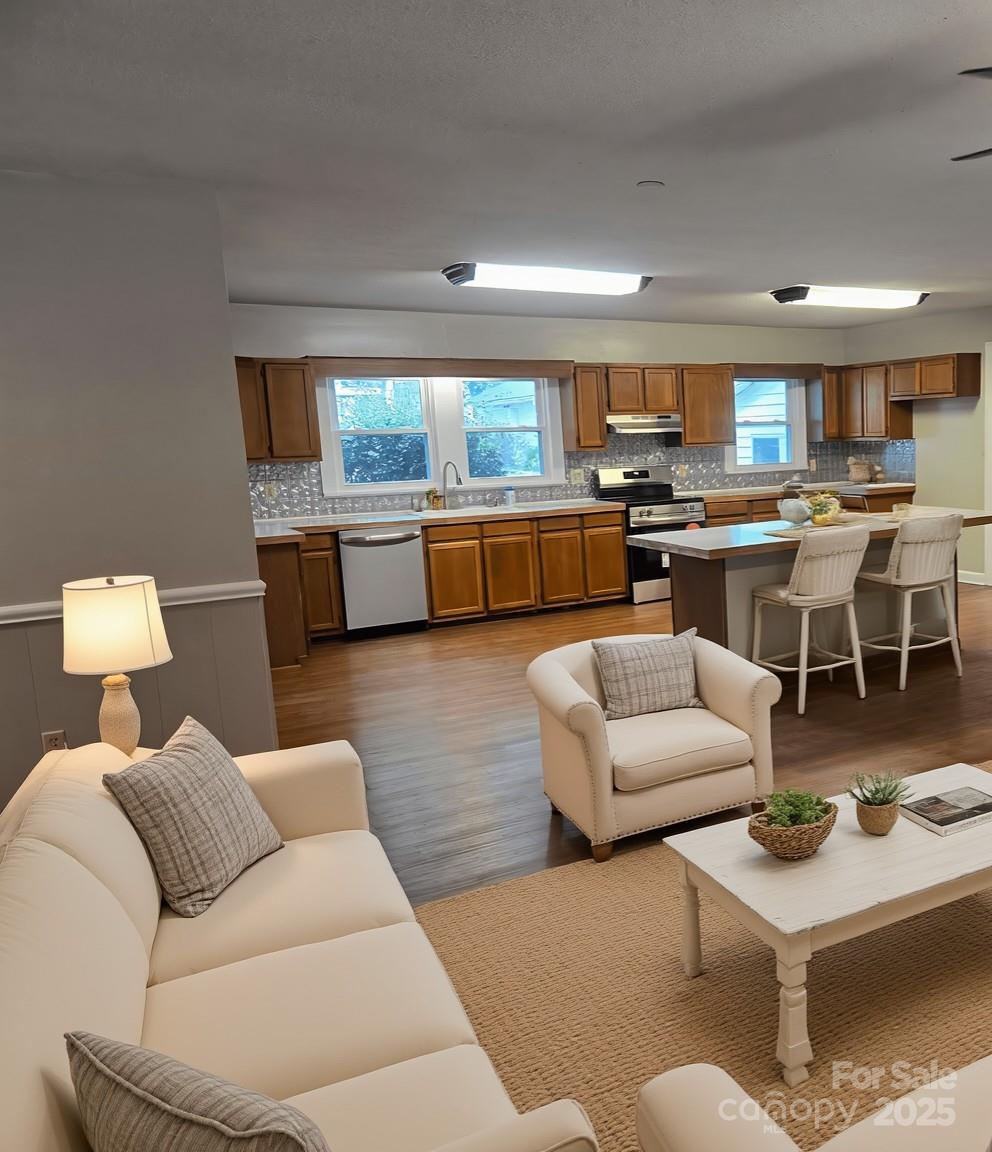 4210 Old Beatty Ford Road China Grove, NC 28023 - Photo 14 of 22 a living room with furniture and view of kitchen