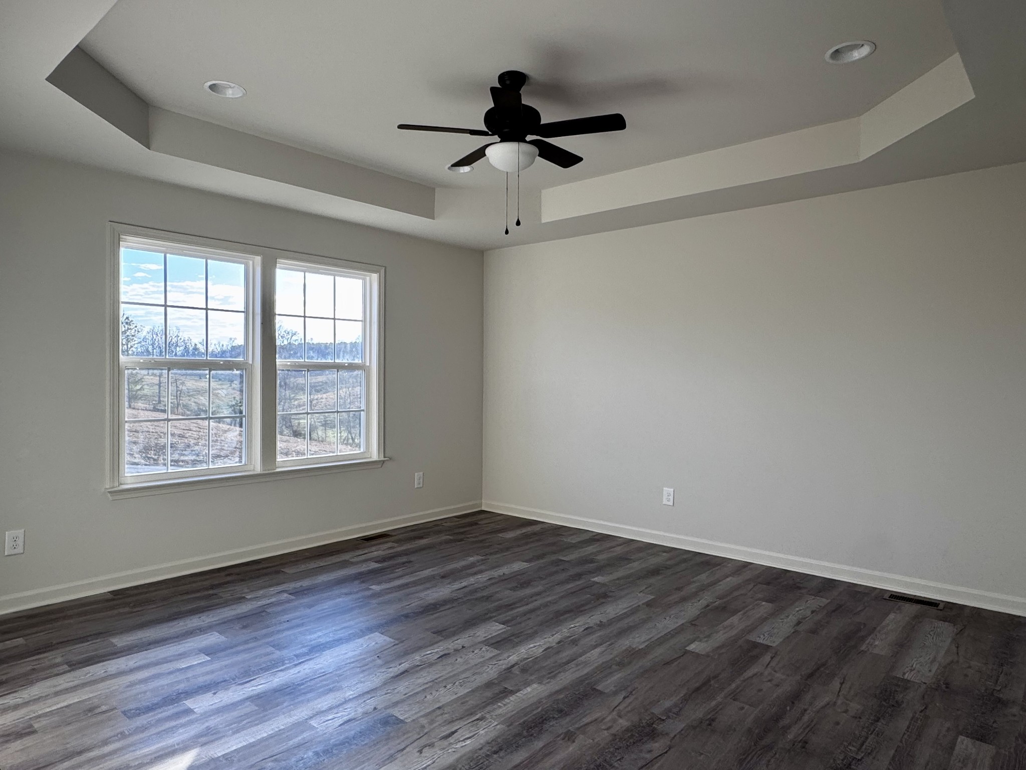 1122 Brannon Road Lawrenceburg, TN 38464 - Photo 12 of 21 a view of empty room with wooden floor and fan