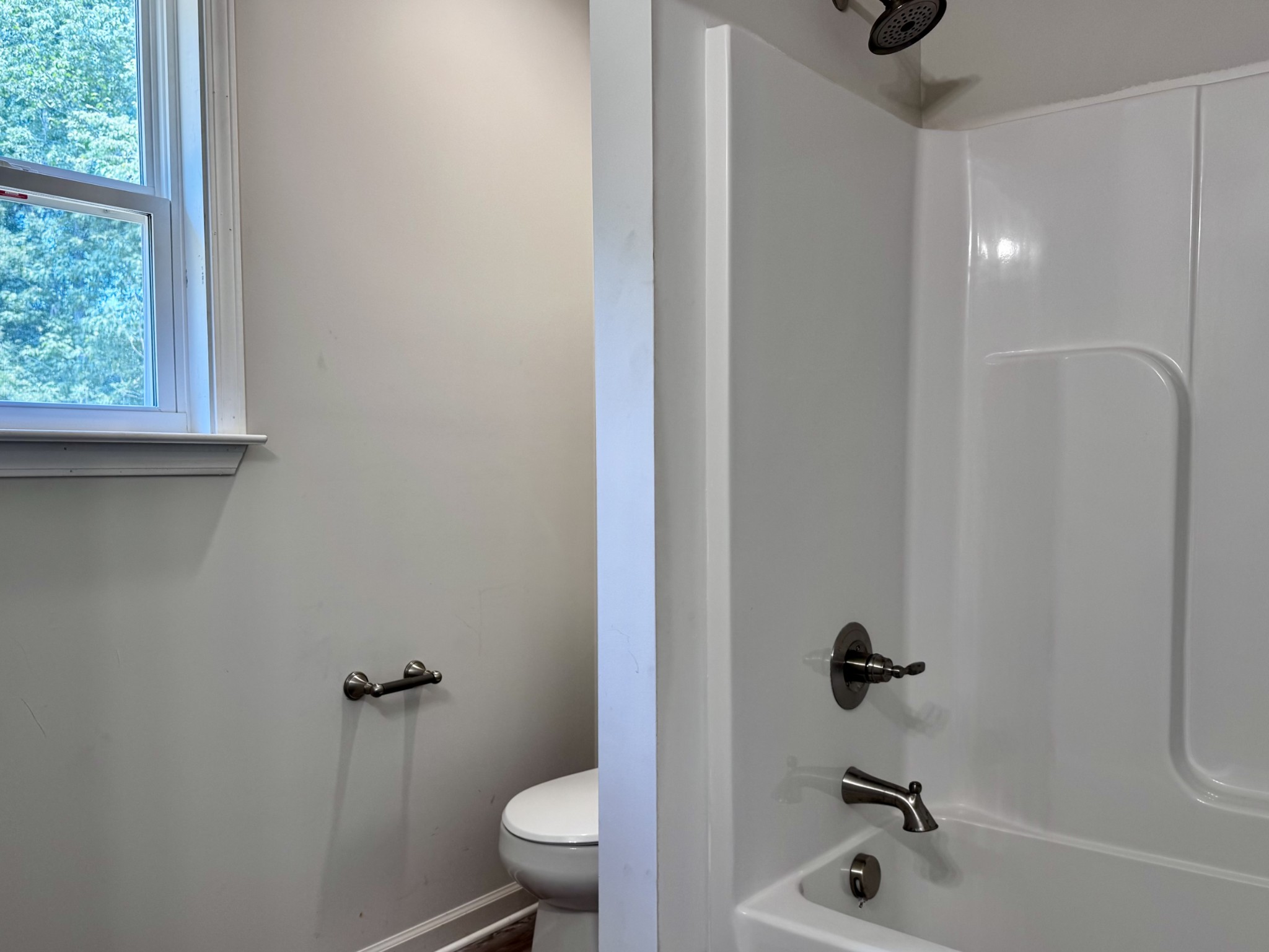 1122 Brannon Road Lawrenceburg, TN 38464 - Photo 18 of 21 a bathroom with a sink toilet and shower