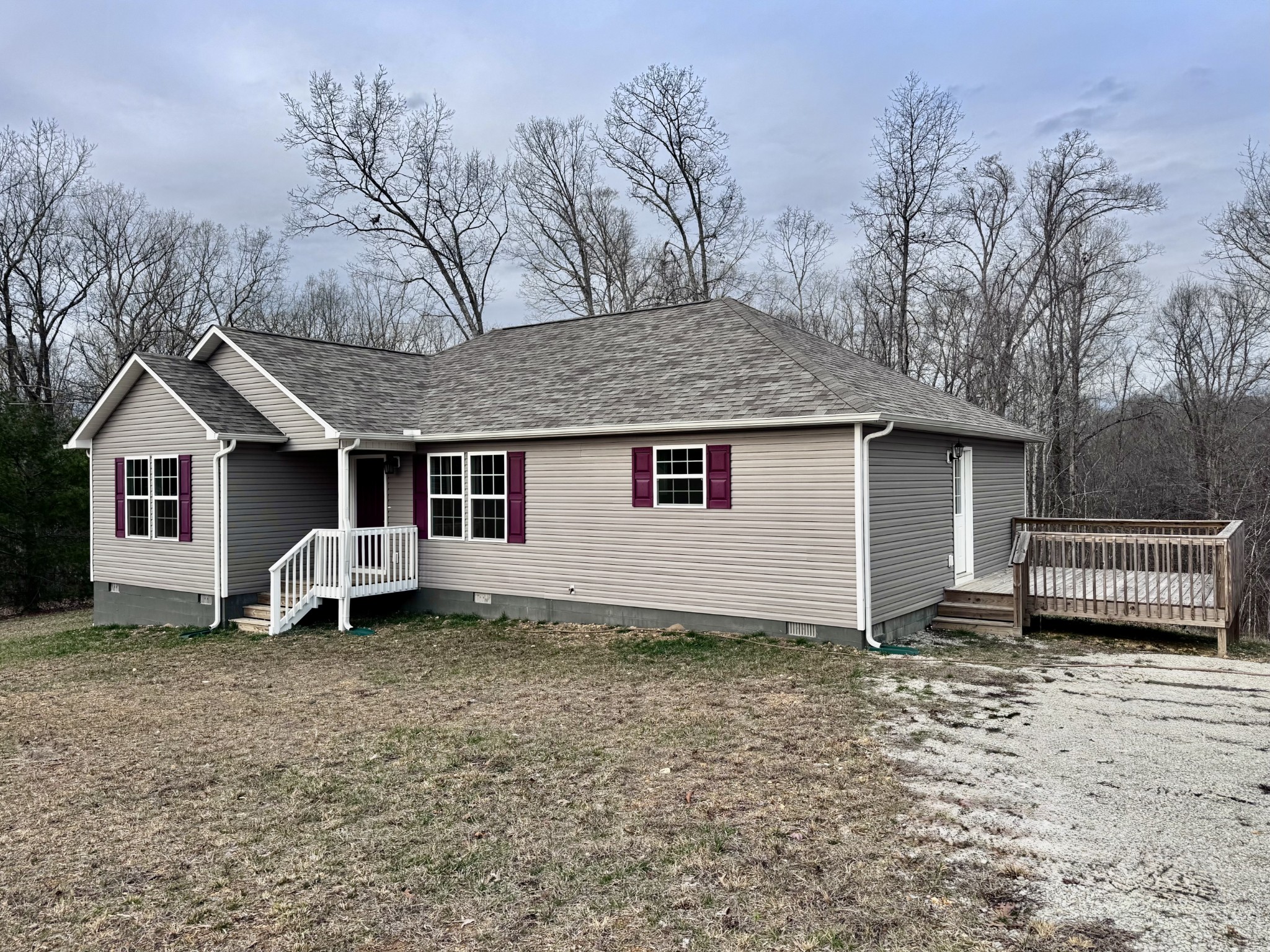 1122 Brannon Road Lawrenceburg, TN 38464 - Photo 21 of 21 a view of a house with a yard and garage