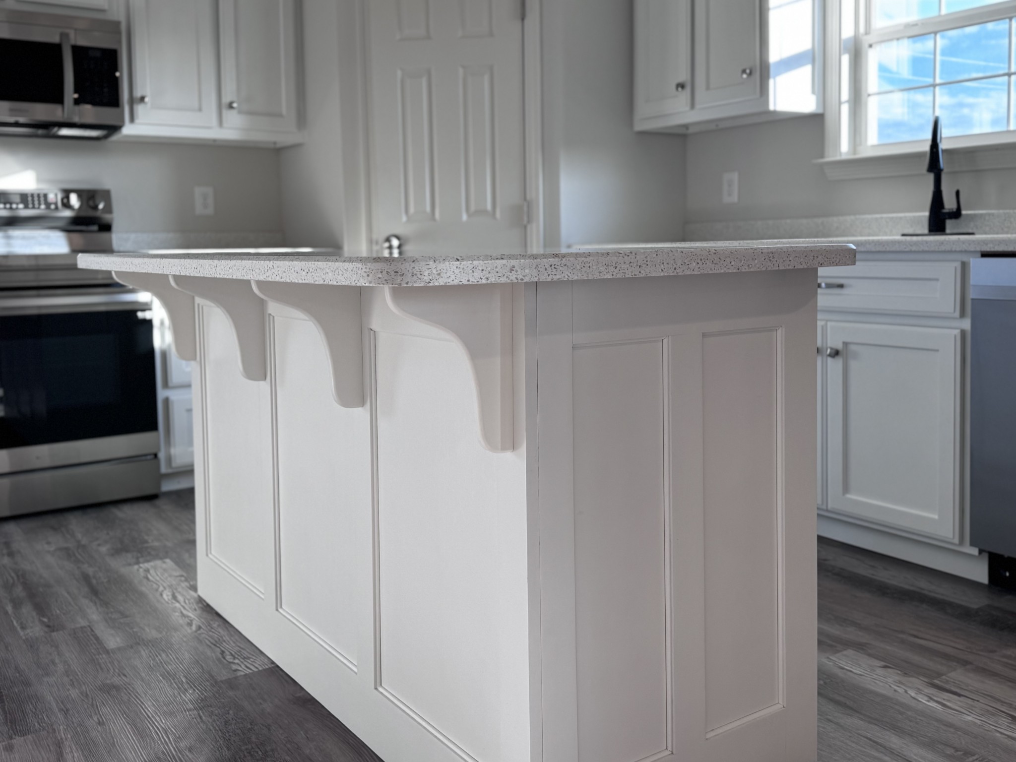 1122 Brannon Road Lawrenceburg, TN 38464 - Photo 8 of 21 a kitchen with stainless steel appliances granite countertop a refrigerator and a stove top oven