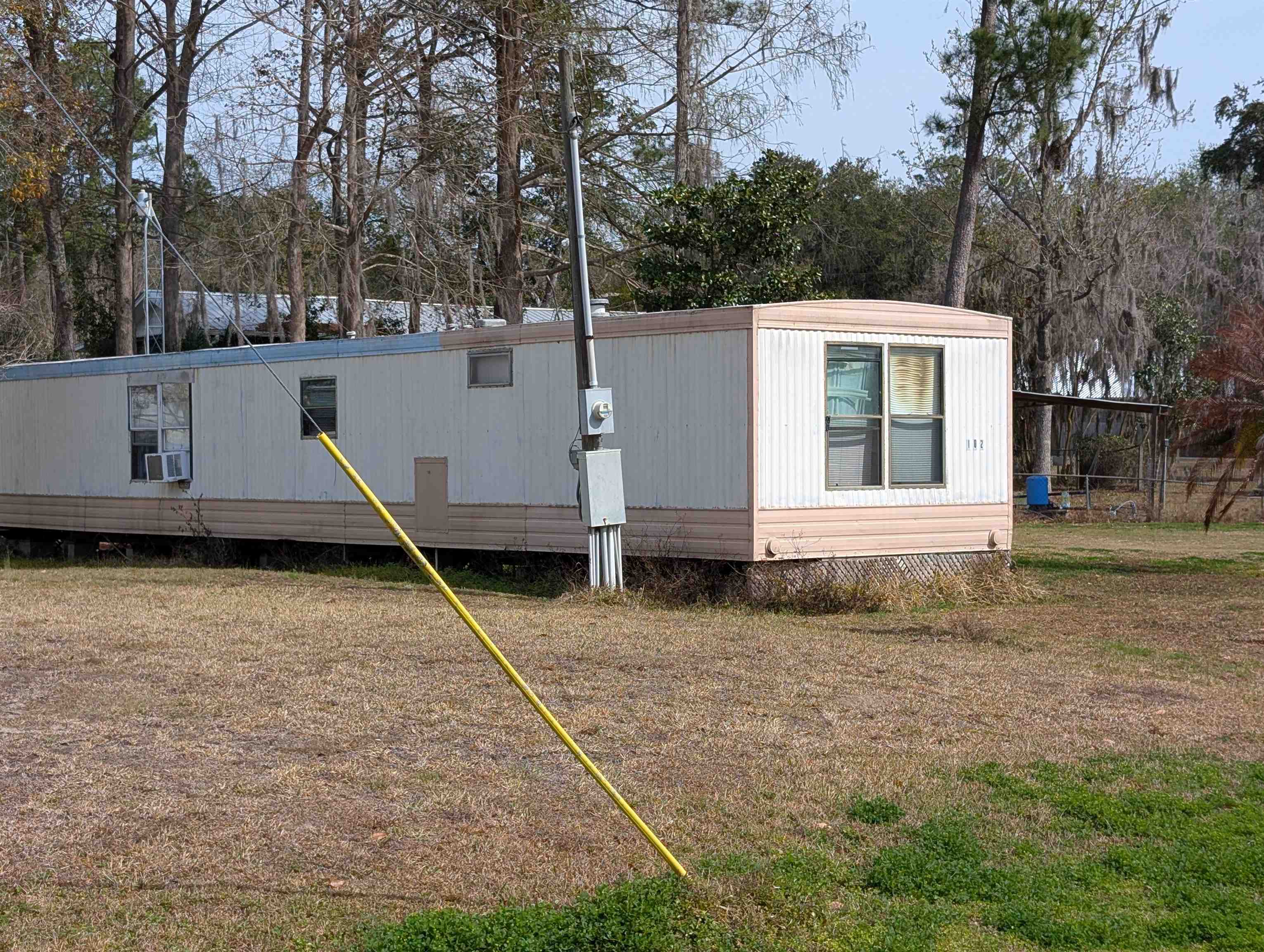 102 Edgewater Road Satsuma, FL 32189 - Photo 13 of 21 a house with trees in the background