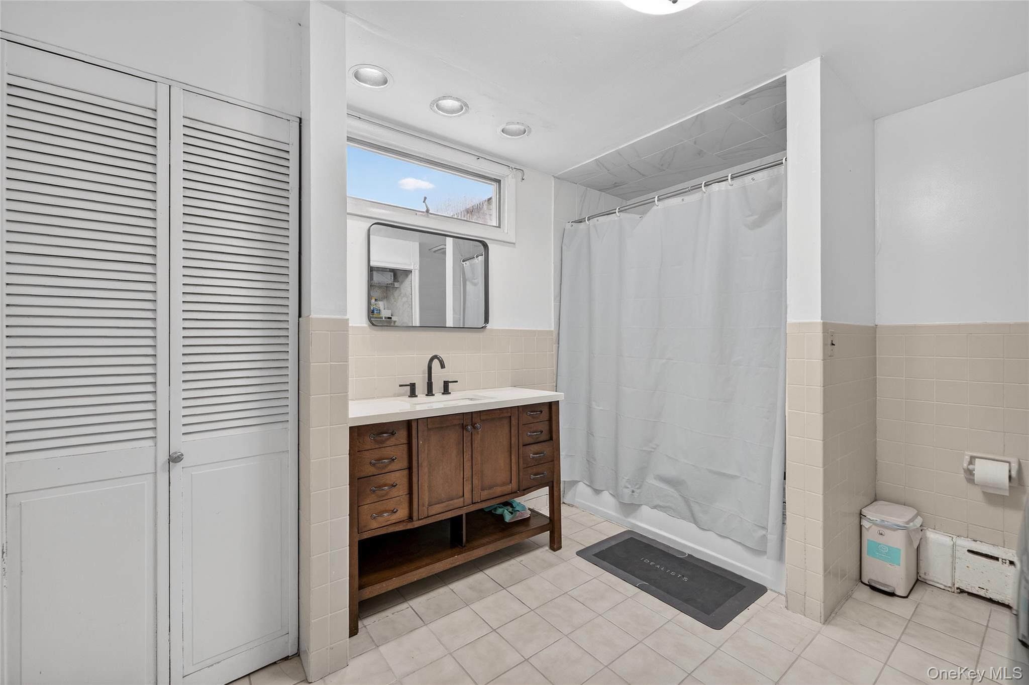 560 Locust Avenue Port Chester, NY 10573 - Photo 20 of 35 a bathroom with a sink toilet and shower