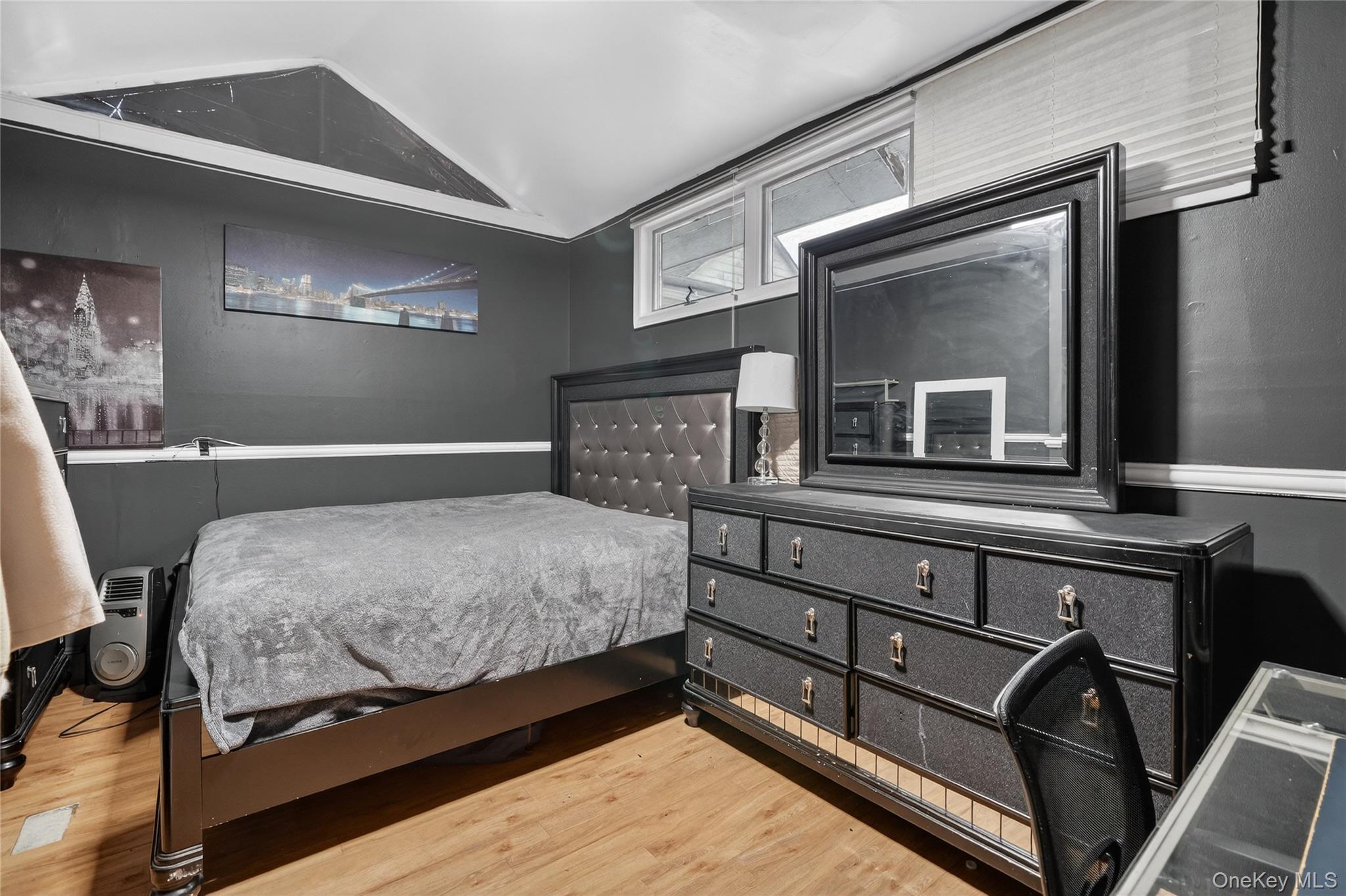 560 Locust Avenue Port Chester, NY 10573 - Photo 23 of 35 a bedroom with a bed and a dresser