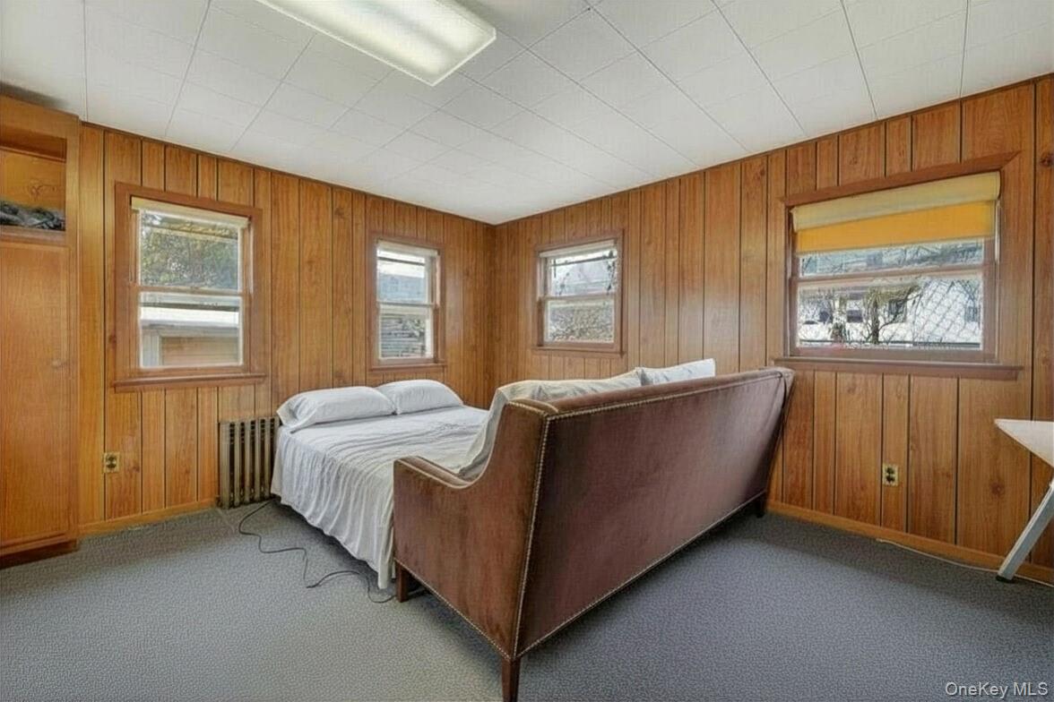 560 Locust Avenue Port Chester, NY 10573 - Photo 34 of 35 a bed room with a bed and a window