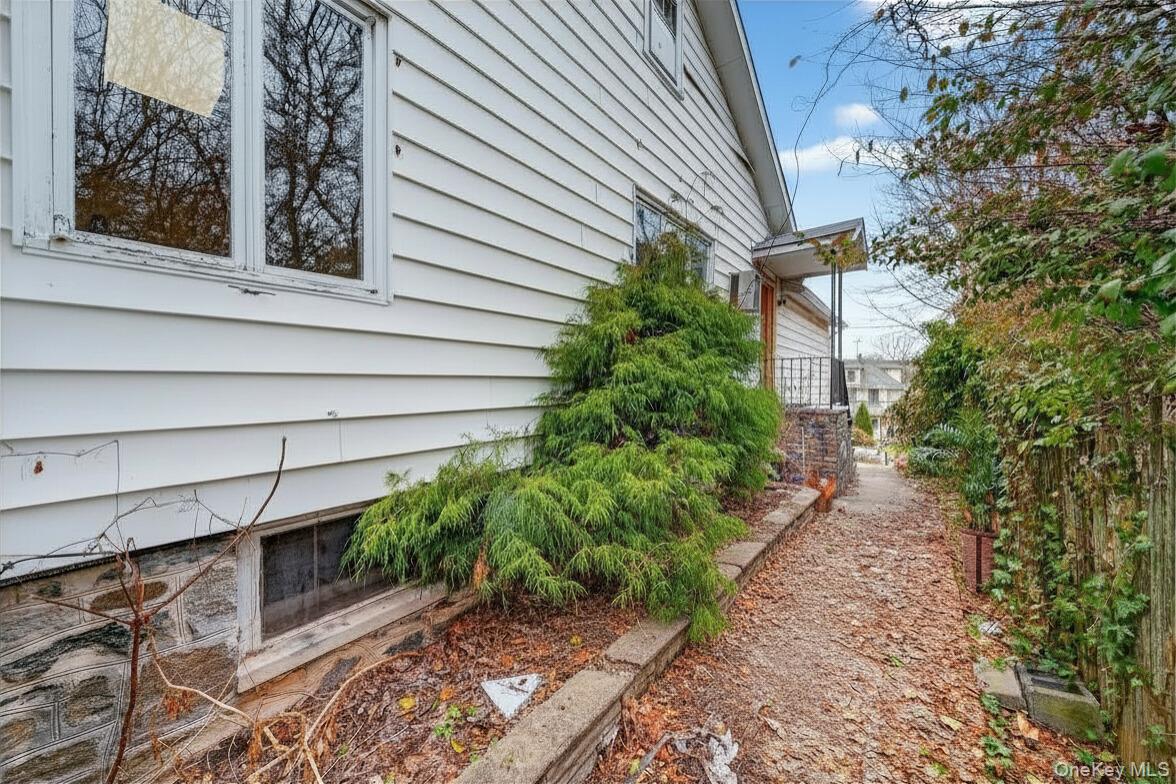560 Locust Avenue Port Chester, NY 10573 - Photo 5 of 35 a view of a pathway with a house