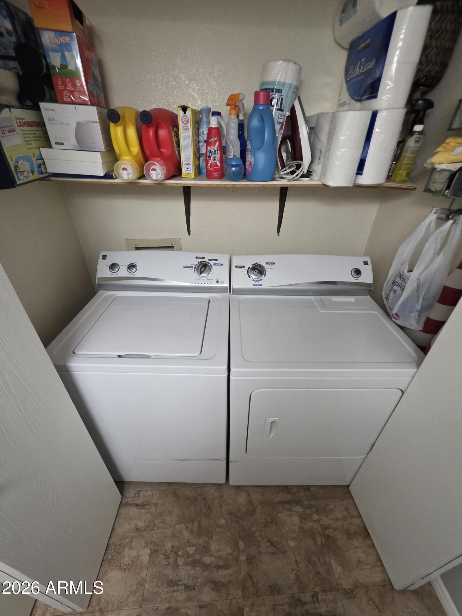 222 West Brown Road, Unit 107 Mesa, AZ 85201 - Photo 16 of 24 a utility room with dryer and washer