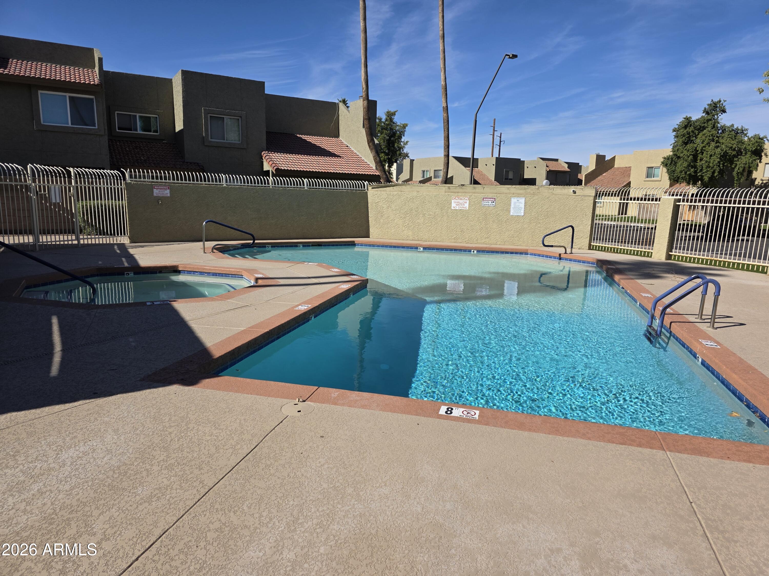 222 West Brown Road, Unit 107 Mesa, AZ 85201 - Photo 21 of 24 a view of a kitchen with a small kitchen