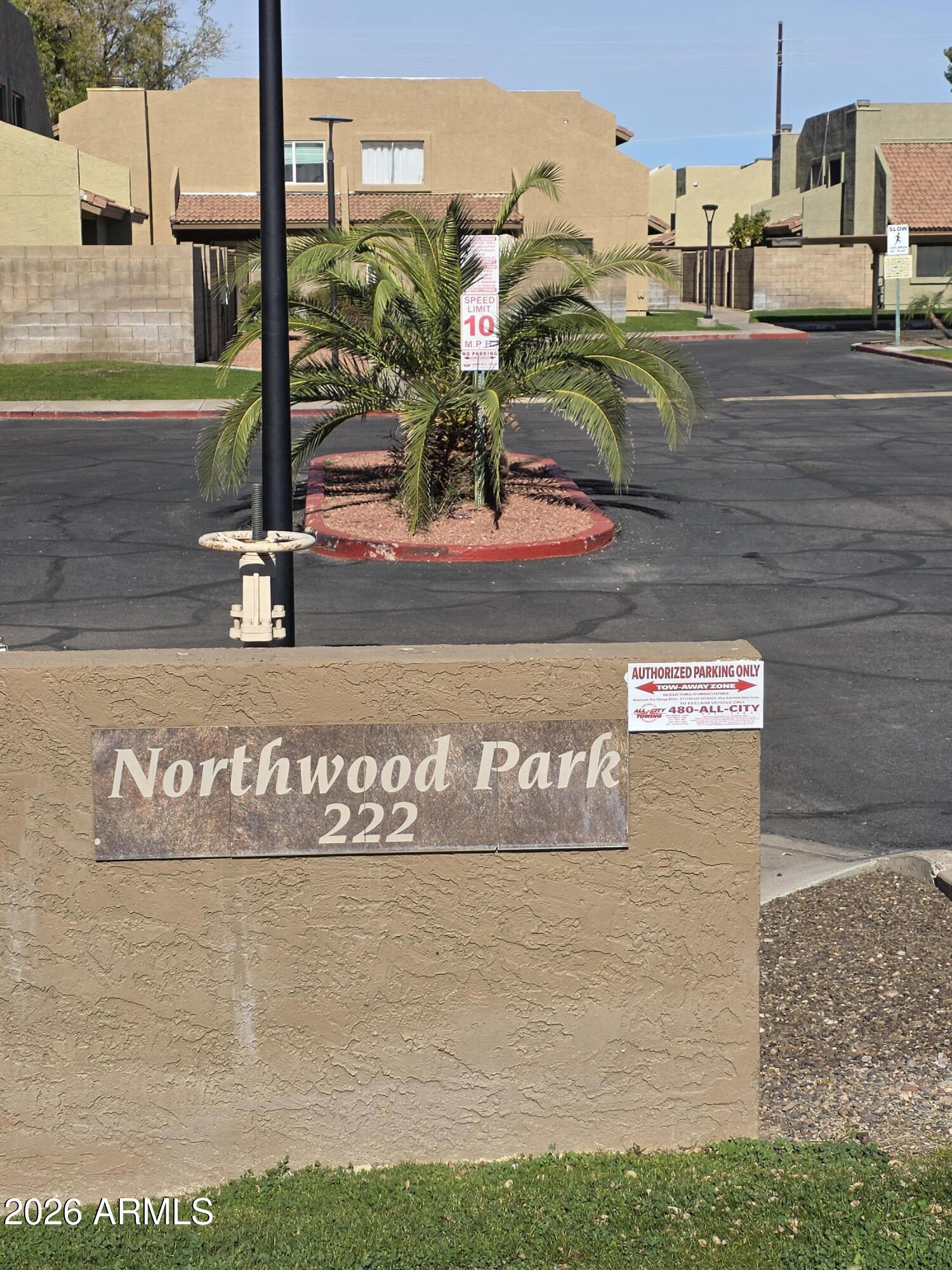 222 West Brown Road, Unit 107 Mesa, AZ 85201 - Photo 23 of 24 a view of outdoor space with sign board
