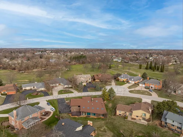 an aerial view of a city with ocean view
