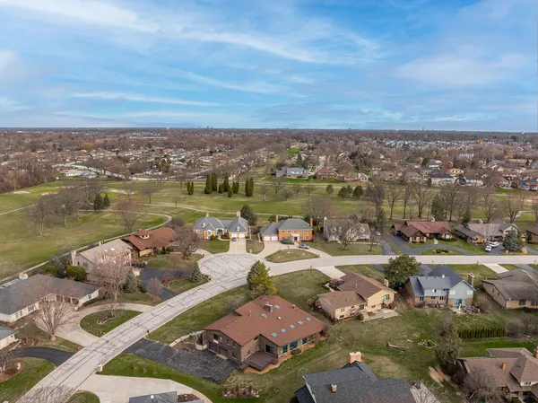 an aerial view of a houses with outdoor space