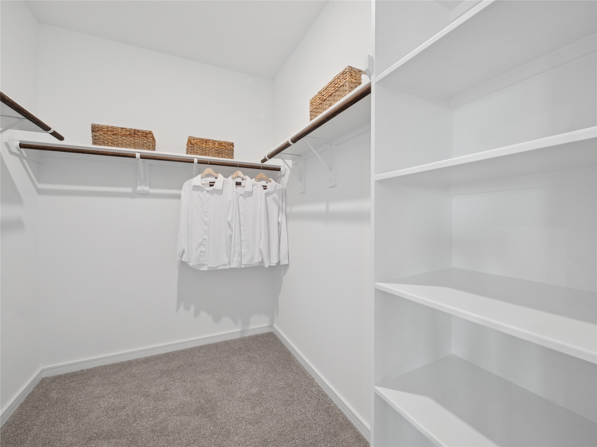 2711 Dark Lantern Drive Rosenberg, TX 77471 - Photo 13 of 36 Primary walk-in closet (*Photo not of actual home and used for illustration purposes only.)