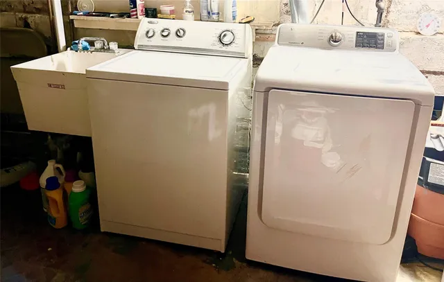 a utility room with dryer and washer