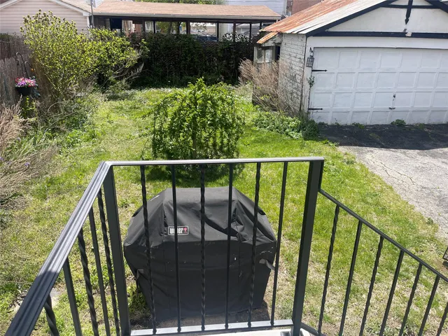 a view of balcony with furniture