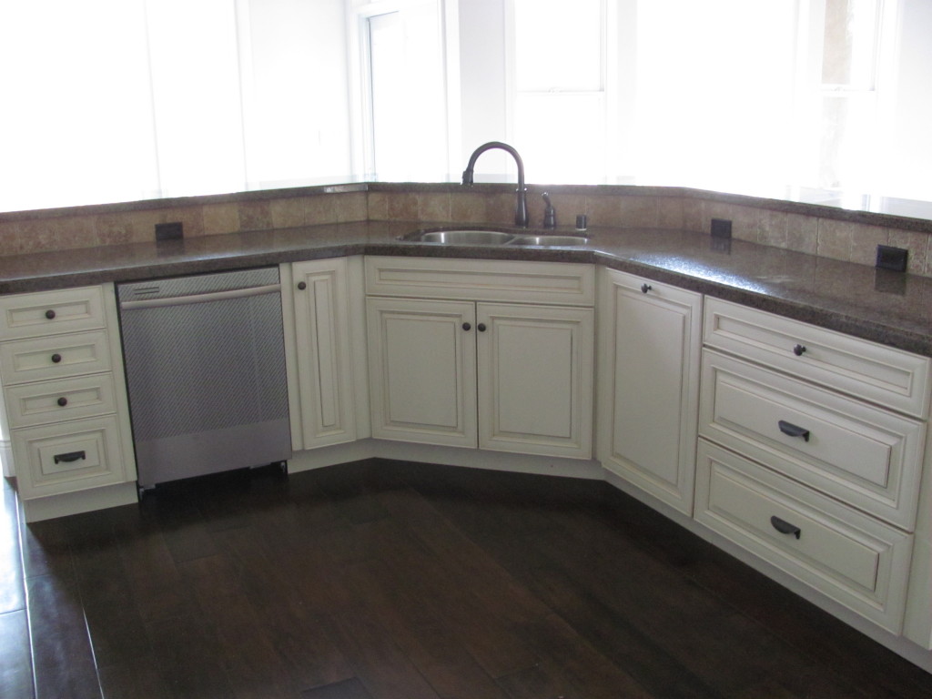 12280 Intermountain Road Redding, CA 96003 - Photo 9 of 45 a kitchen with cabinets and sink