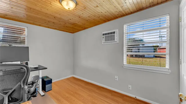 a kitchen with stainless steel appliances granite countertop a refrigerator a sink dishwasher a stove top oven a refrigerator and cabinets