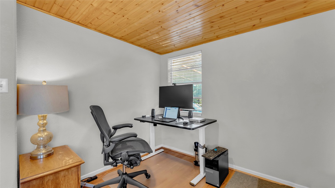 1415 Bee Lane Tow, TX 78672 - Photo 27 of 39 a work room with furniture and gym equipment