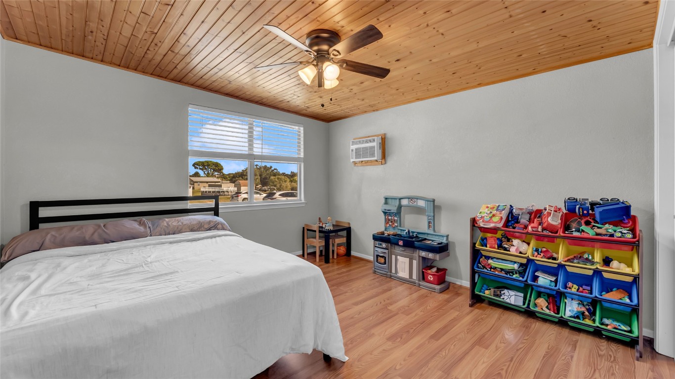 1415 Bee Lane Tow, TX 78672 - Photo 34 of 39 a bedroom with bed room and window