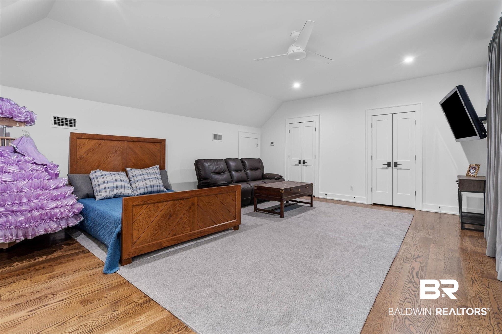 4602 Kingswood Drive Mobile, AL 36608 - Photo 35 of 45 Bedroom featuring vaulted ceiling, wood finished floors, multiple closets, ceiling fan, and recessed lighting