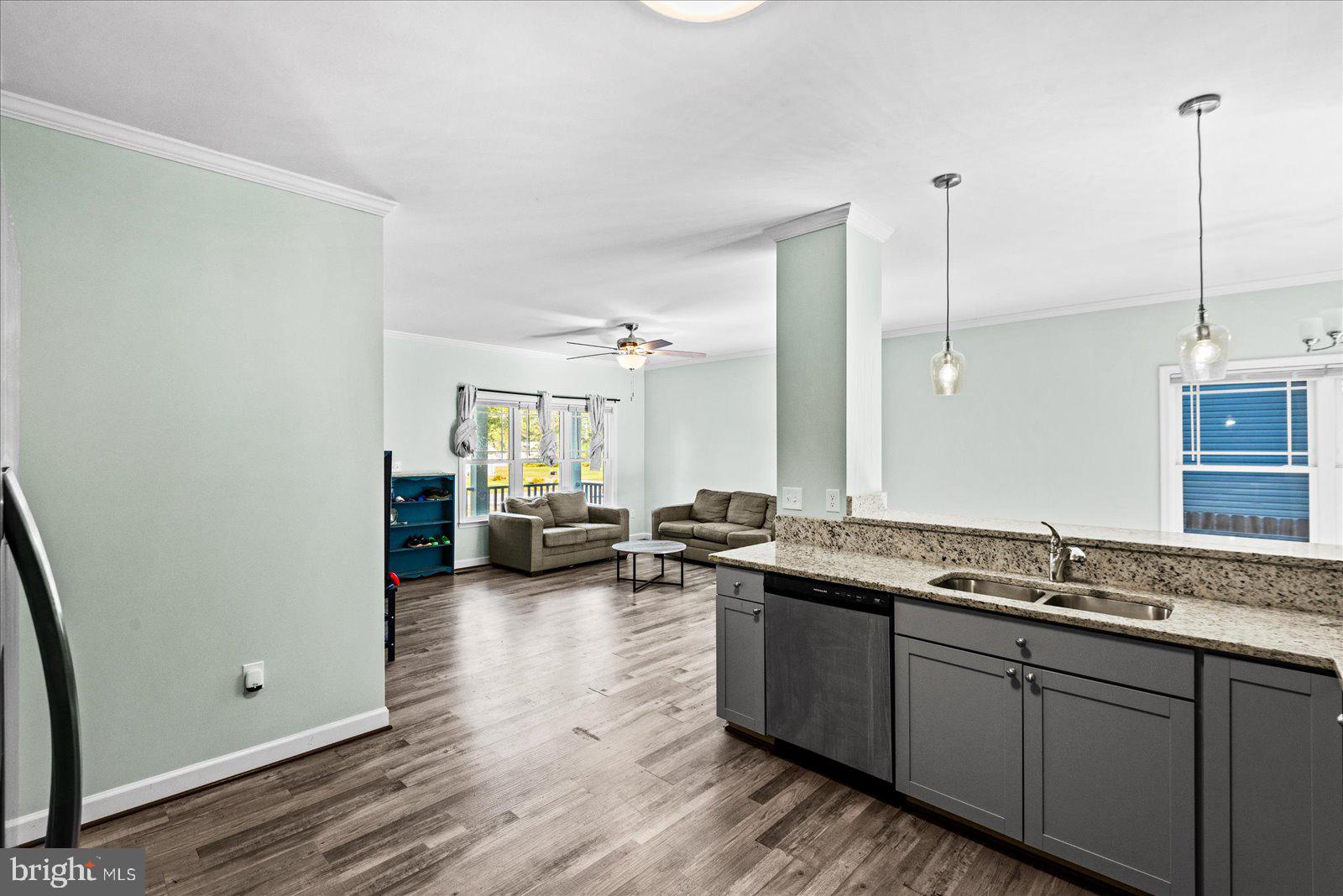 88 Brooks Drive Colonial Beach, VA 22443 - Photo 13 of 36 a kitchen with a sink and a wooden floor