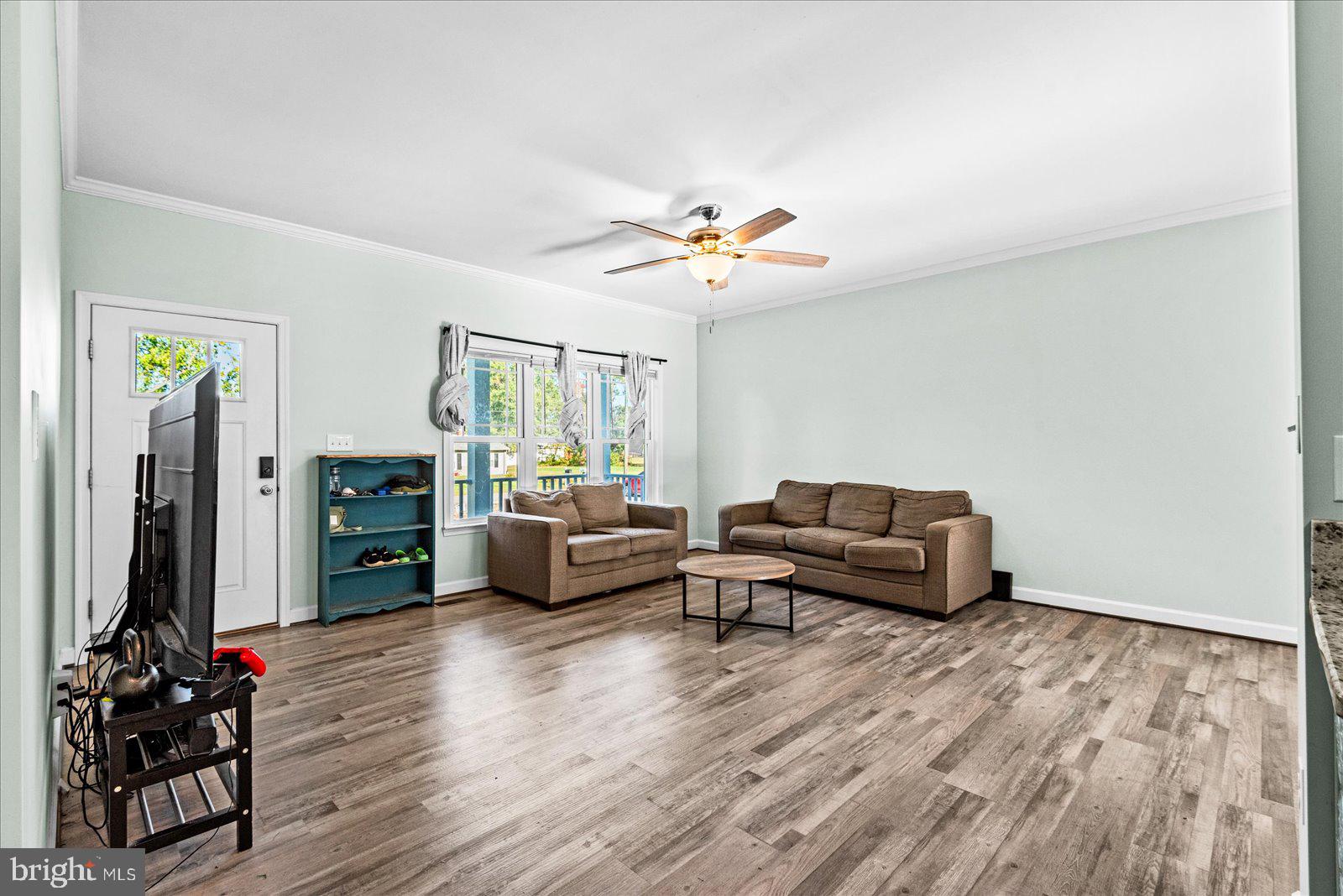 88 Brooks Drive Colonial Beach, VA 22443 - Photo 5 of 36 a living room with furniture and wooden floor