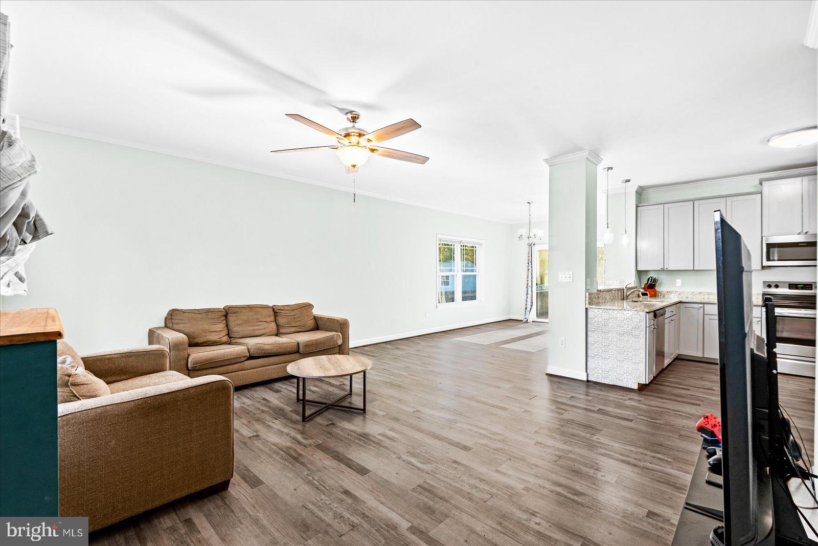 88 Brooks Drive Colonial Beach, VA 22443 - Photo 7 of 36 a living room with furniture and wooden floor