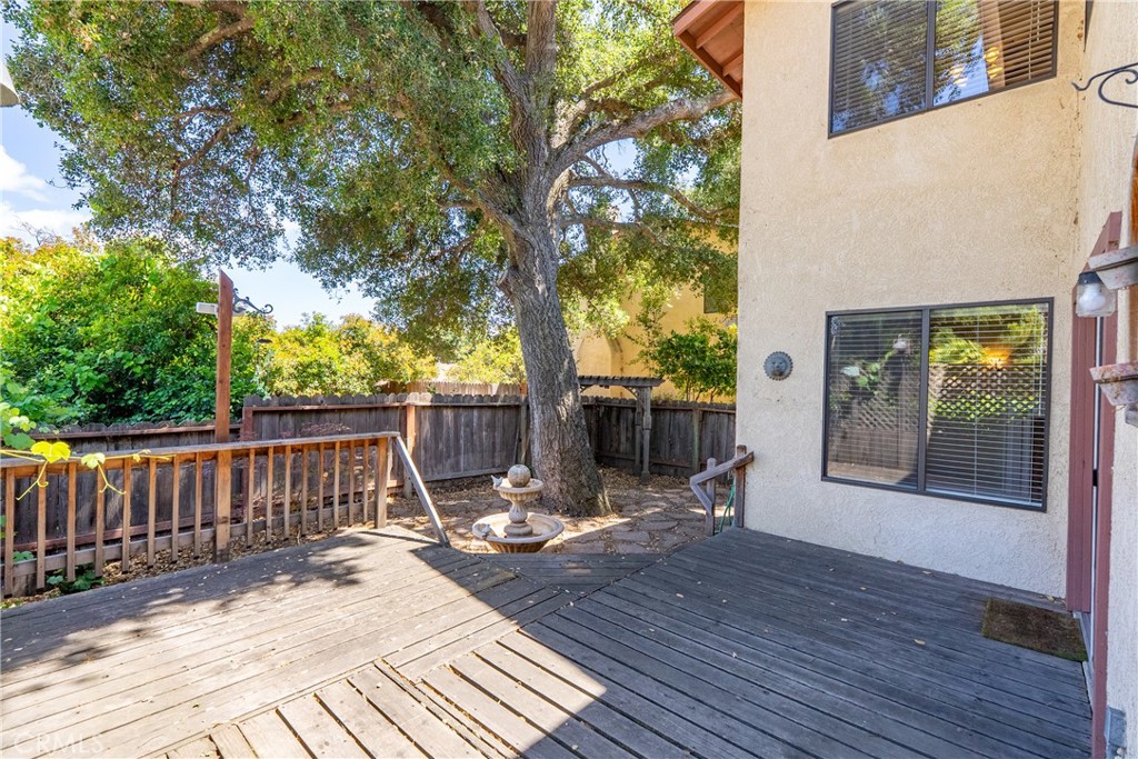 6815 Santa Lucia Road, Unit 5 Atascadero, CA 93422 - Photo 33 of 44 Private back yard is fully fenced and shaded by a mature tree.
