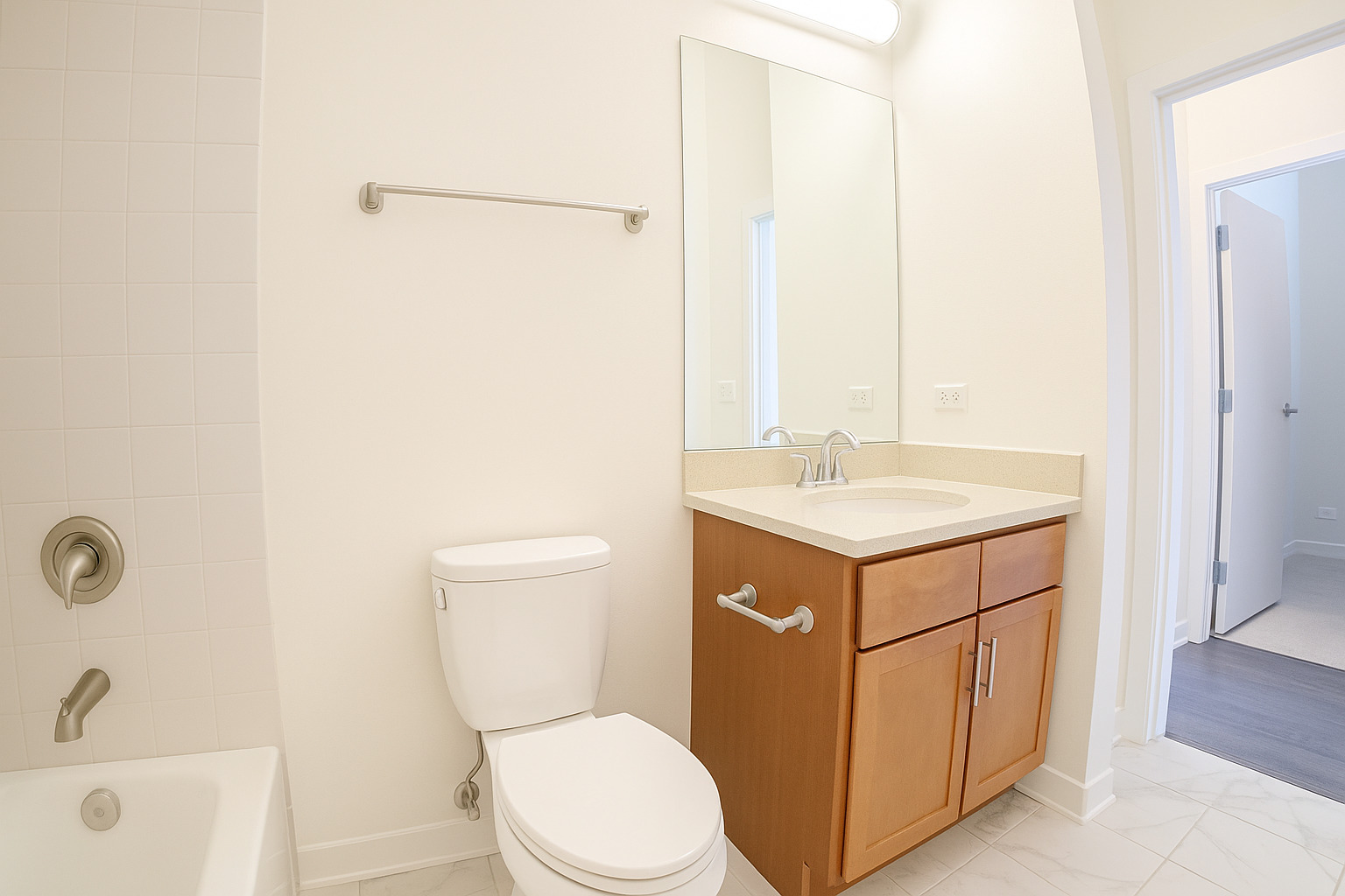 1540 West Fullerton Avenue, Unit 405 Chicago, IL 60614 - Photo 16 of 17 a bathroom with a sink toilet vanity and tub