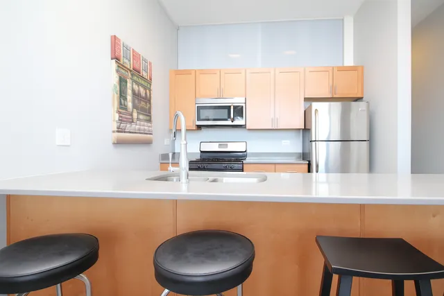 a close up of a storage and utility room with a washer and dryer
