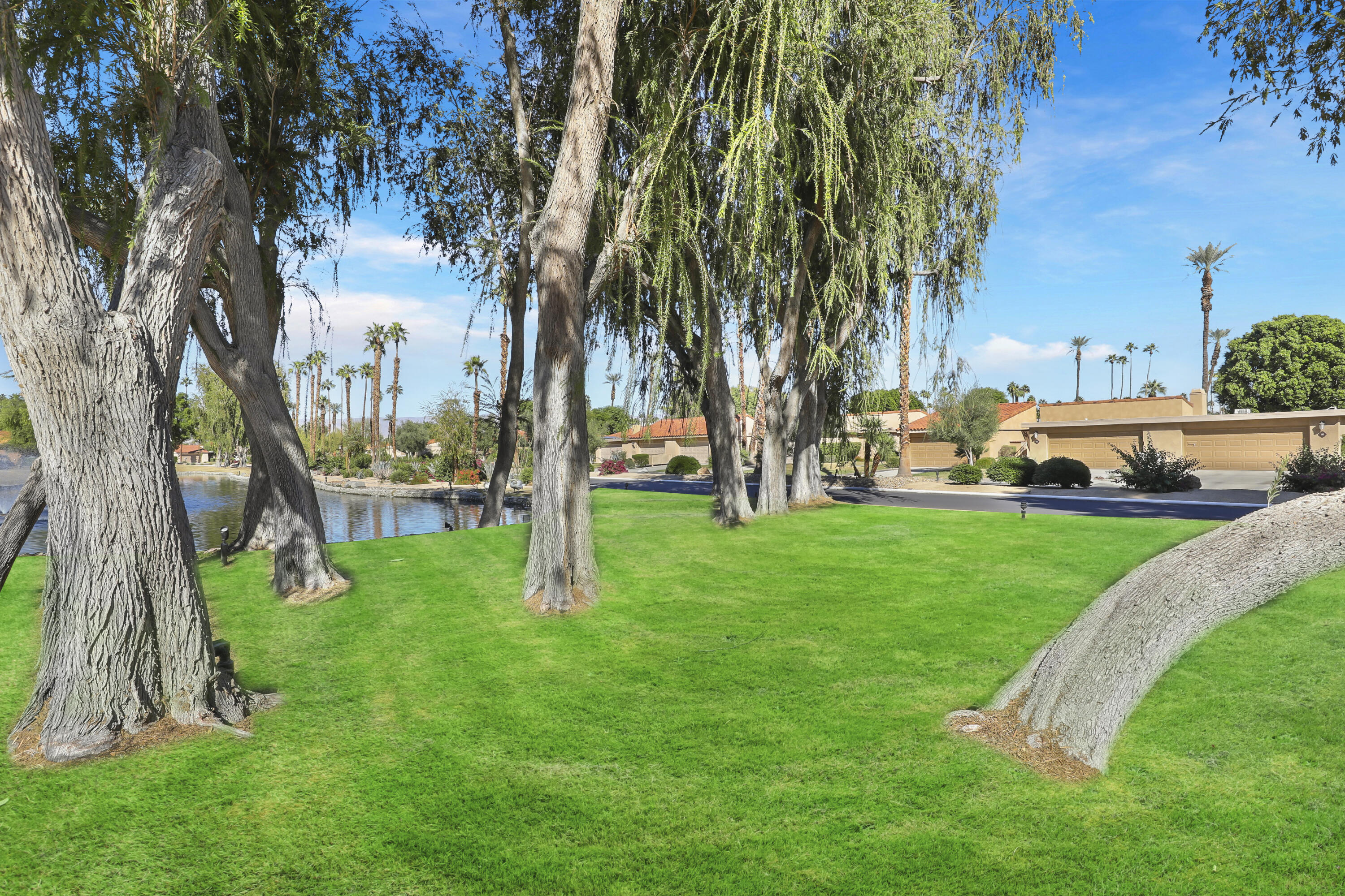 2 Valencia Drive Rancho Mirage, CA 92270 - Photo 15 of 39 a view of a park with large trees