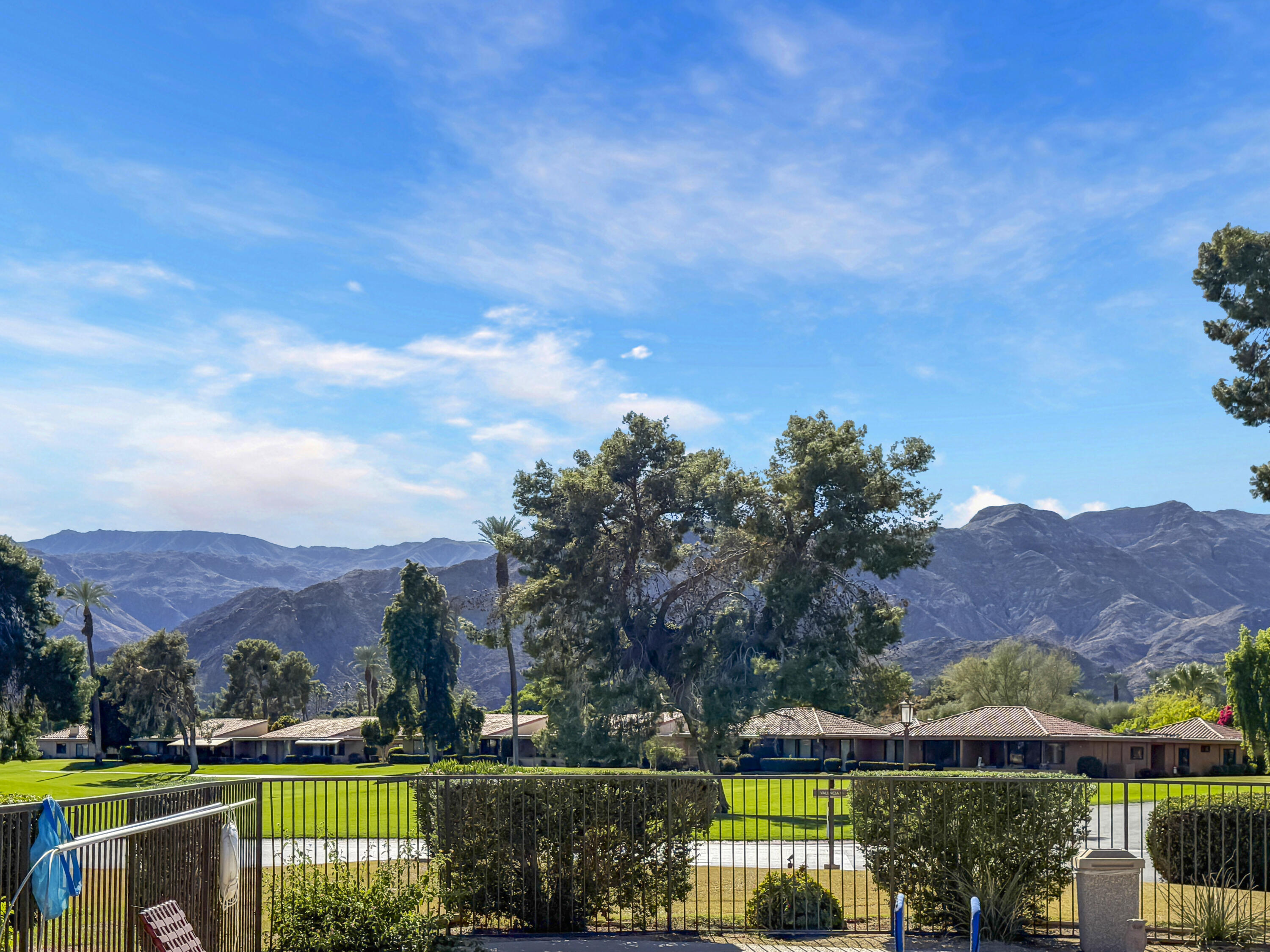 2 Valencia Drive Rancho Mirage, CA 92270 - Photo 20 of 39 a view of swimming pool with outdoor space and lake view
