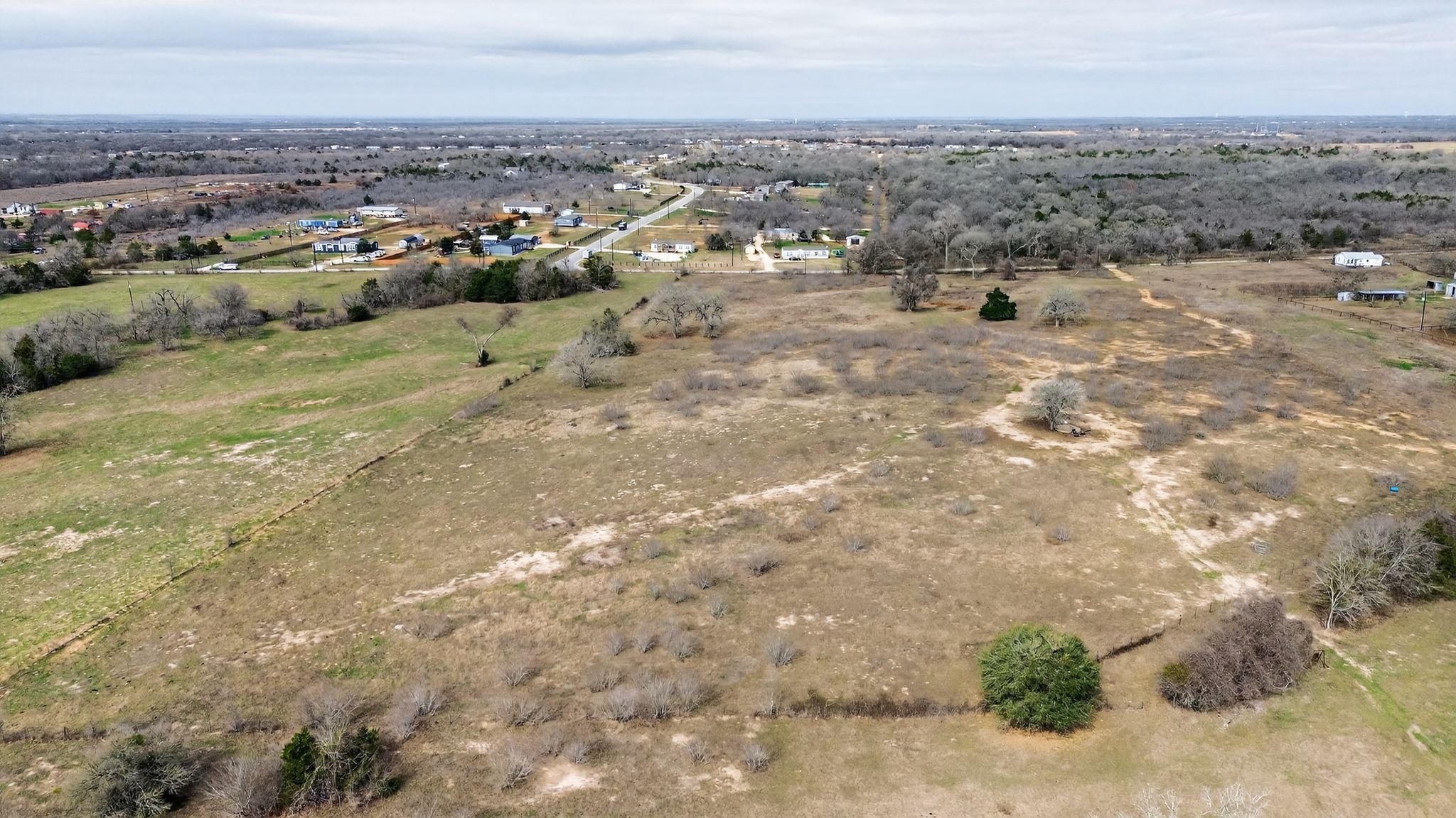 701 Old Colony Line Road Dale, TX 78616 - Photo 13 of 16 an aerial view of residential houses with outdoor space