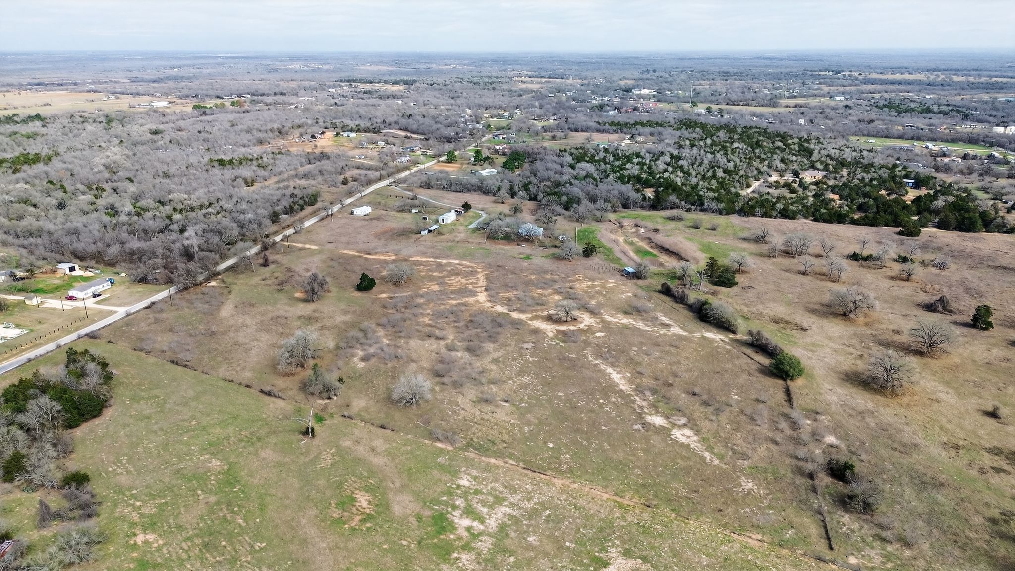 701 Old Colony Line Road Dale, TX 78616 - Photo 14 of 16 a view of a dry yard with trees