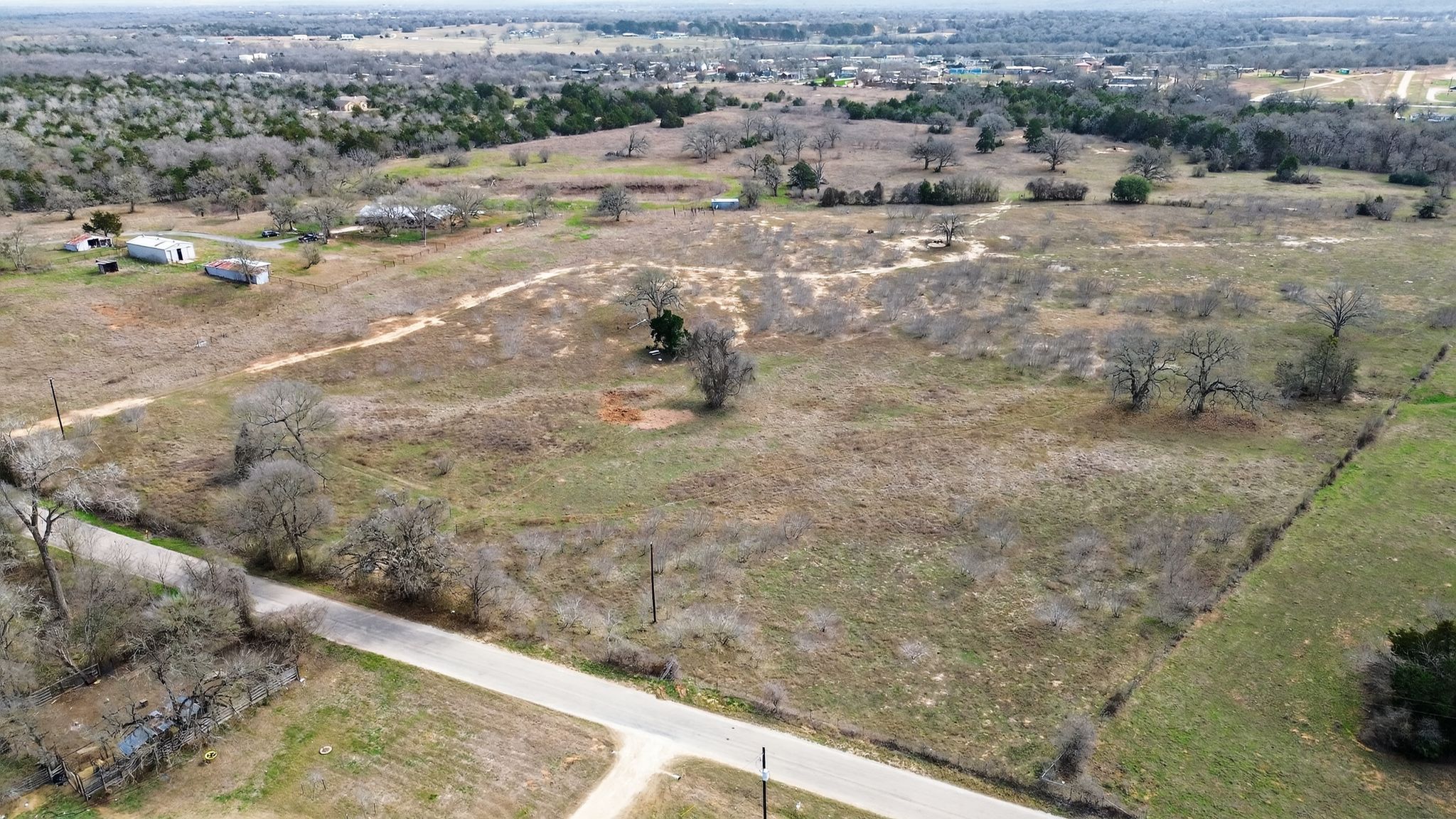 701 Old Colony Line Road Dale, TX 78616 - Photo 8 of 16 a view of a dry yard with wooden fence