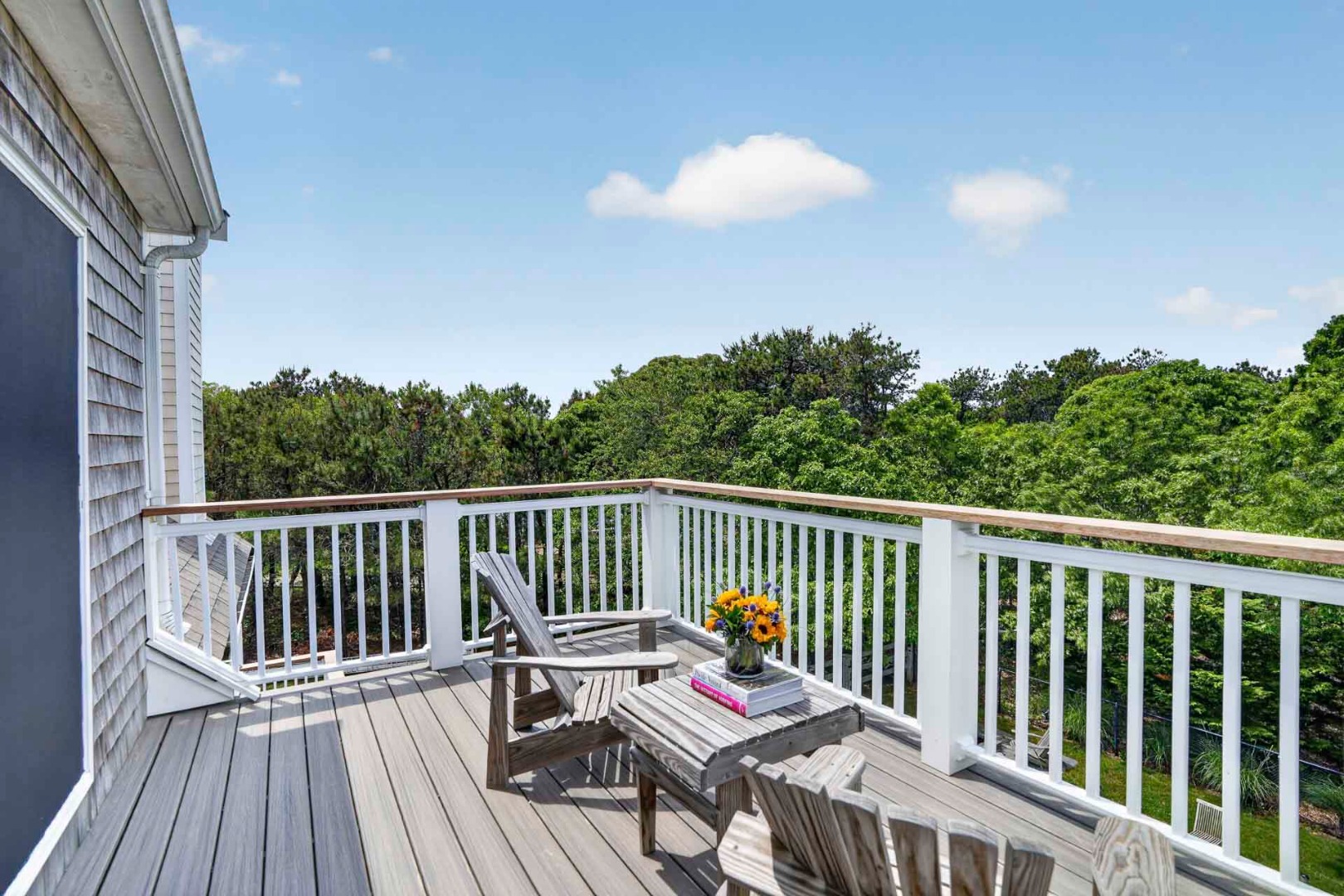 9 Thaxter Lane Edgartown, MA 02539 - Photo 29 of 53 a view of balcony with wooden floor and fence
