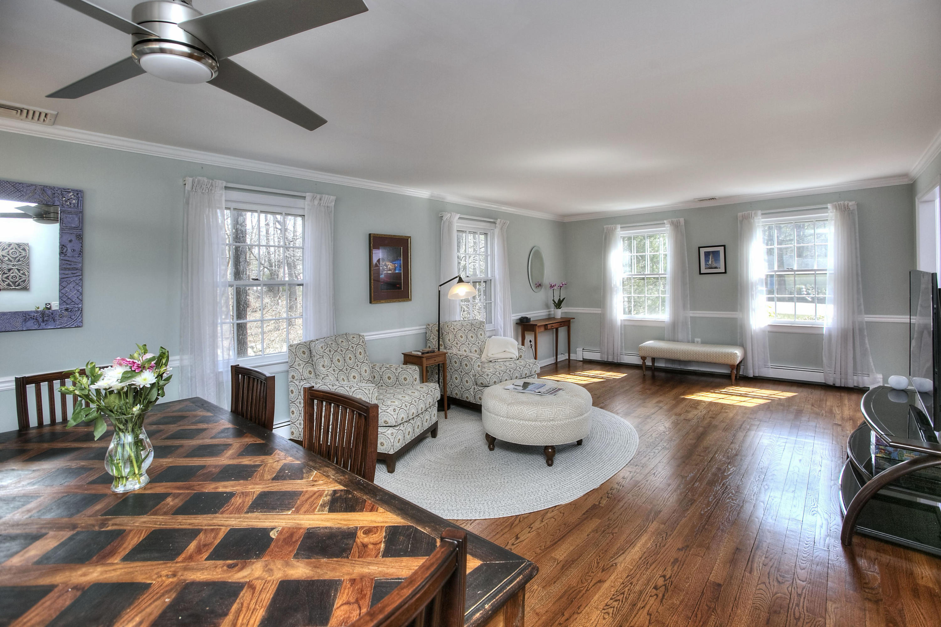 16 Arrowhead Road Wilton, CT 06897 - Photo 11 of 37 a living room with fireplace furniture and a wooden floor