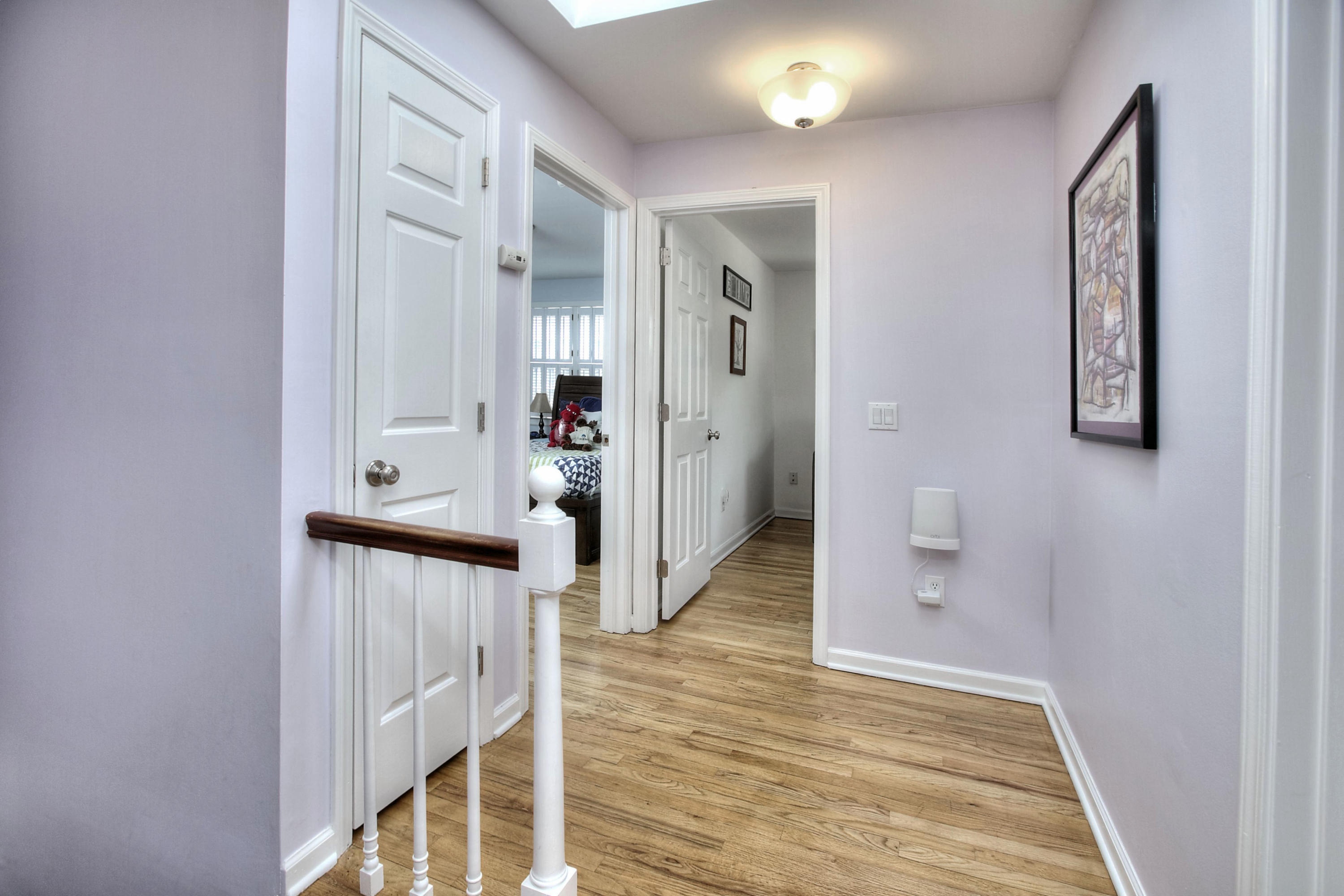 16 Arrowhead Road Wilton, CT 06897 - Photo 15 of 37 a view of hallway with wooden floor