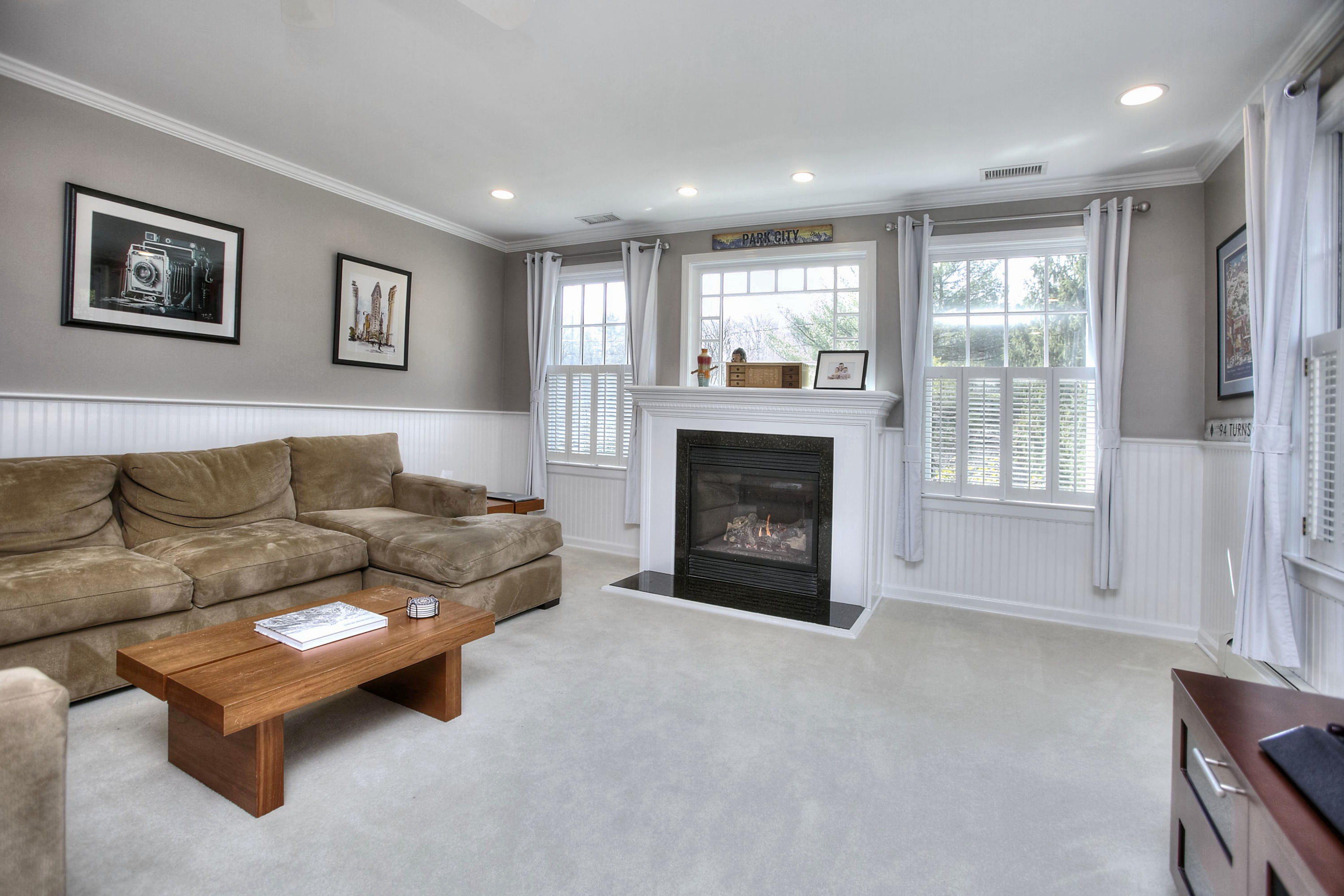 16 Arrowhead Road Wilton, CT 06897 - Photo 20 of 37 a living room with furniture and a fireplace