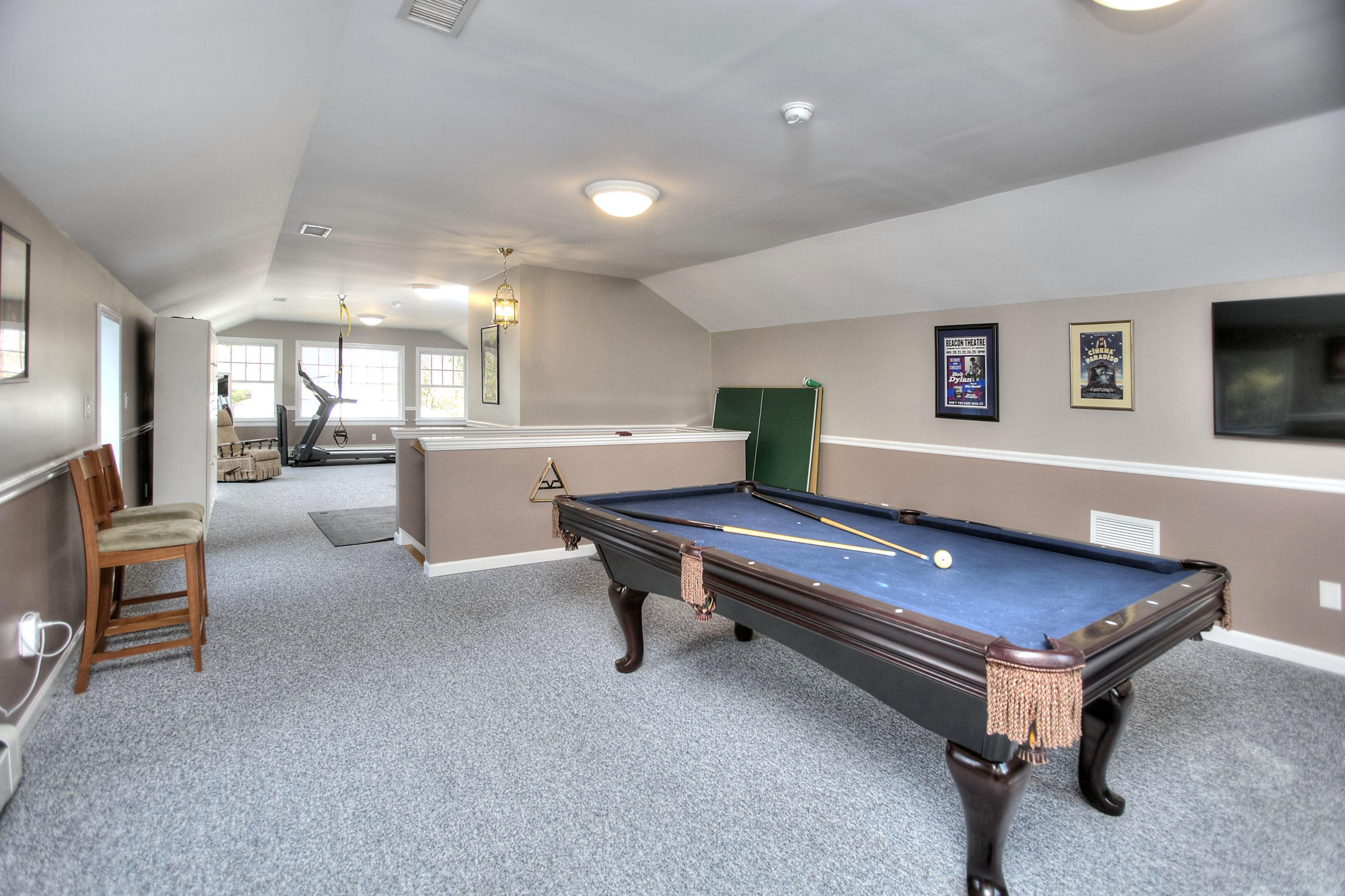 16 Arrowhead Road Wilton, CT 06897 - Photo 26 of 37 a room with furniture and a table