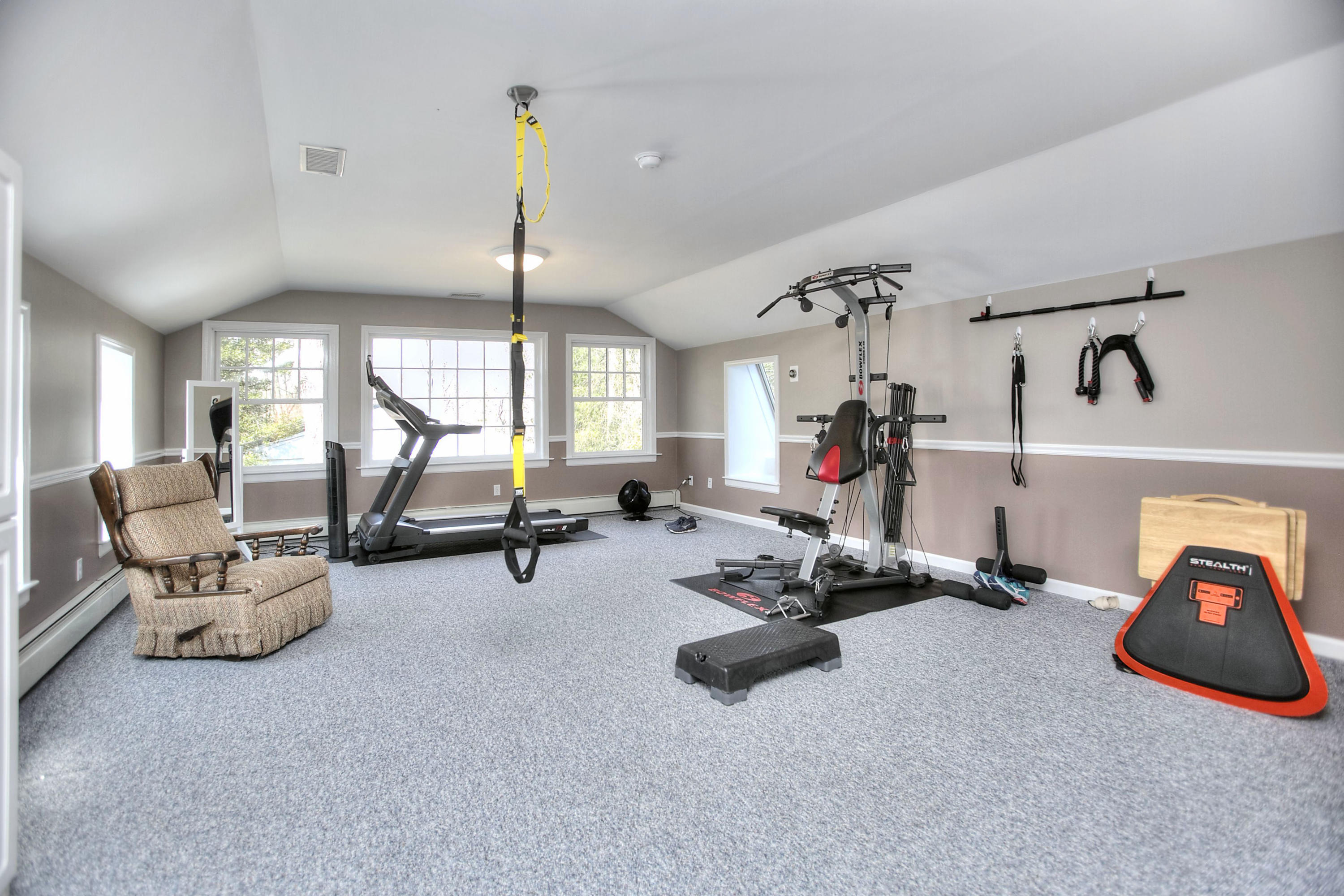 16 Arrowhead Road Wilton, CT 06897 - Photo 28 of 37 a view of a room with gym equipment