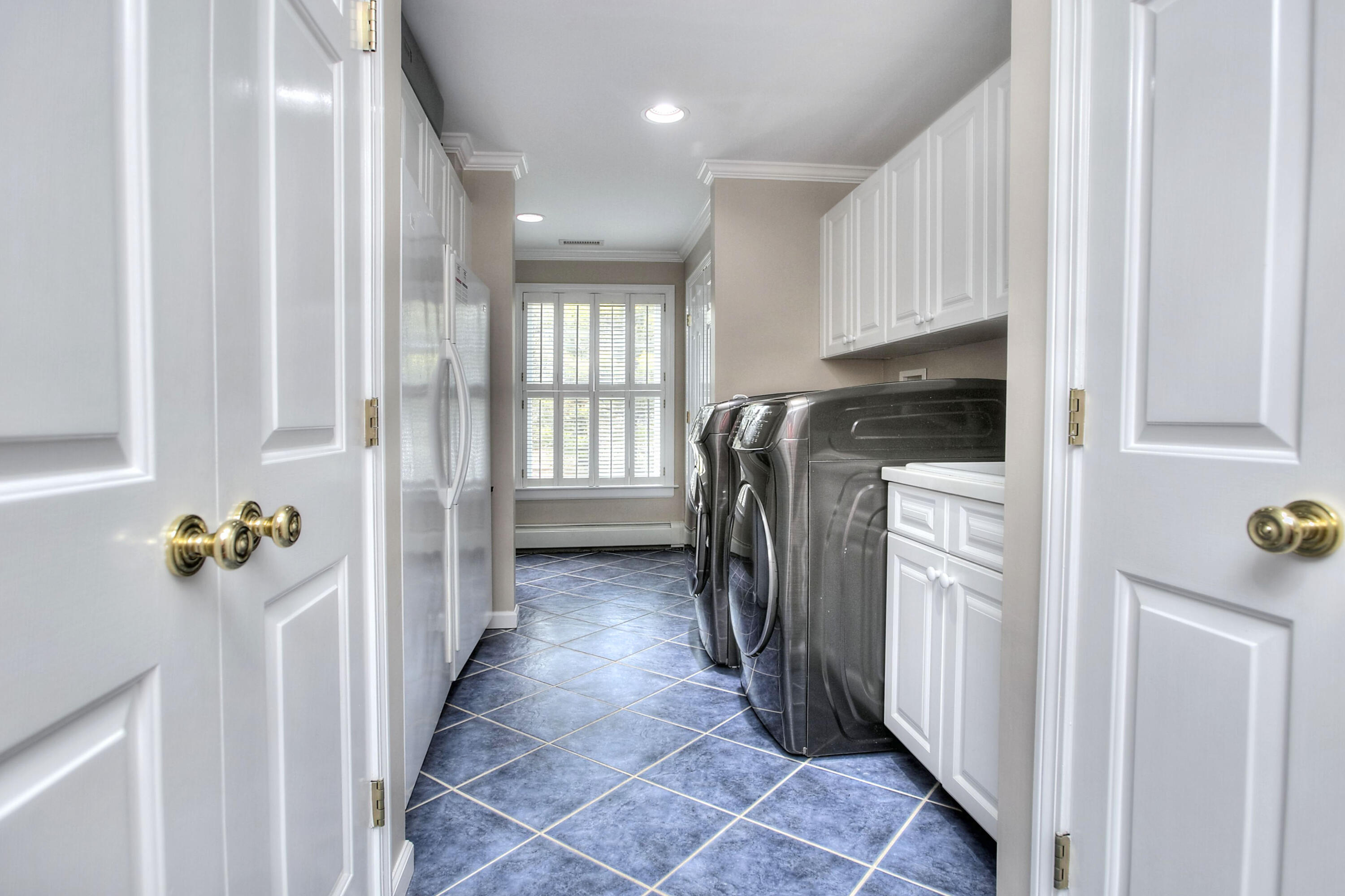 16 Arrowhead Road Wilton, CT 06897 - Photo 29 of 37 a view of a utility room with a window
