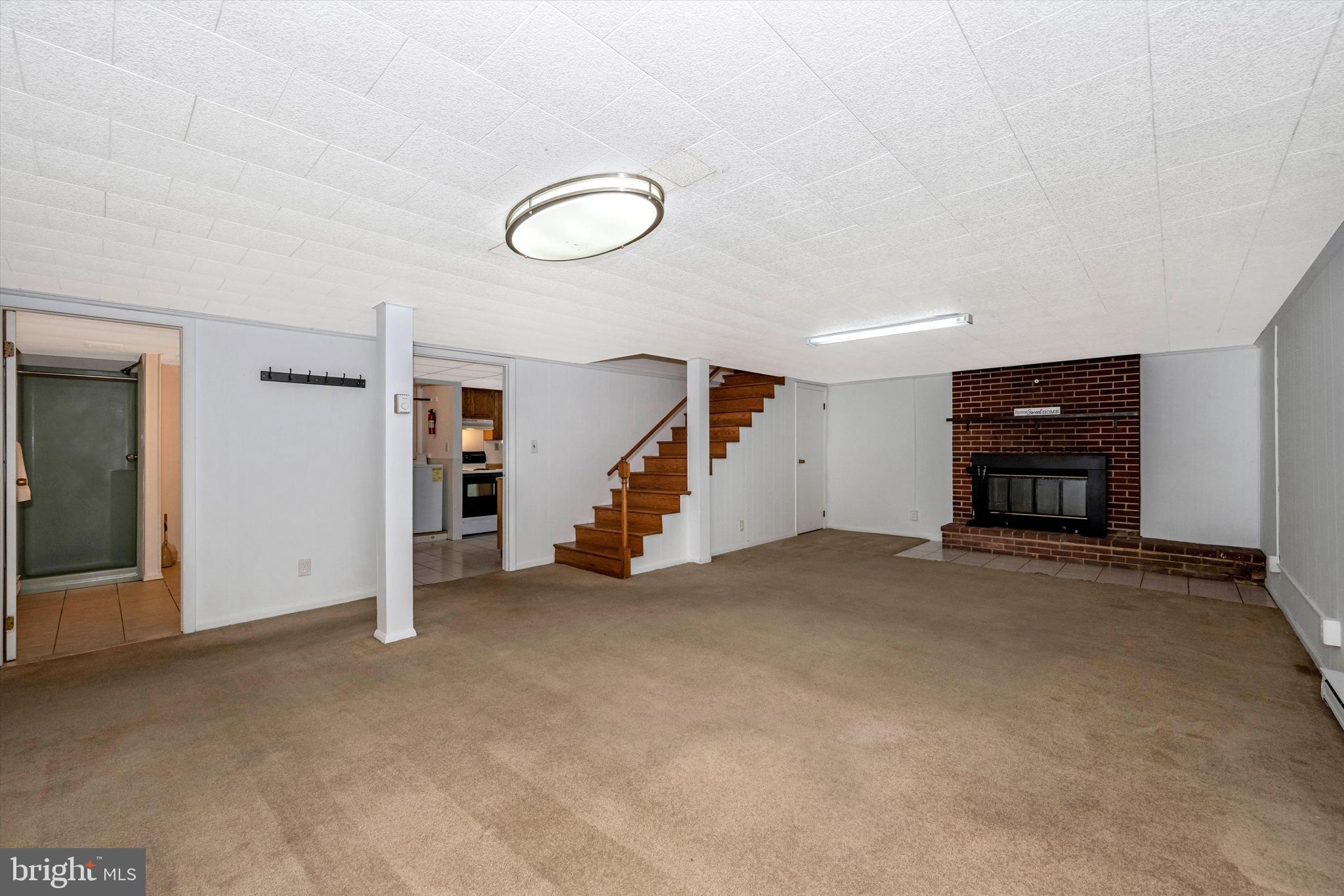 4603 Ridge Road Mount Airy, MD 21771 - Photo 18 of 32 Lower Level Family Room with Fireplace
