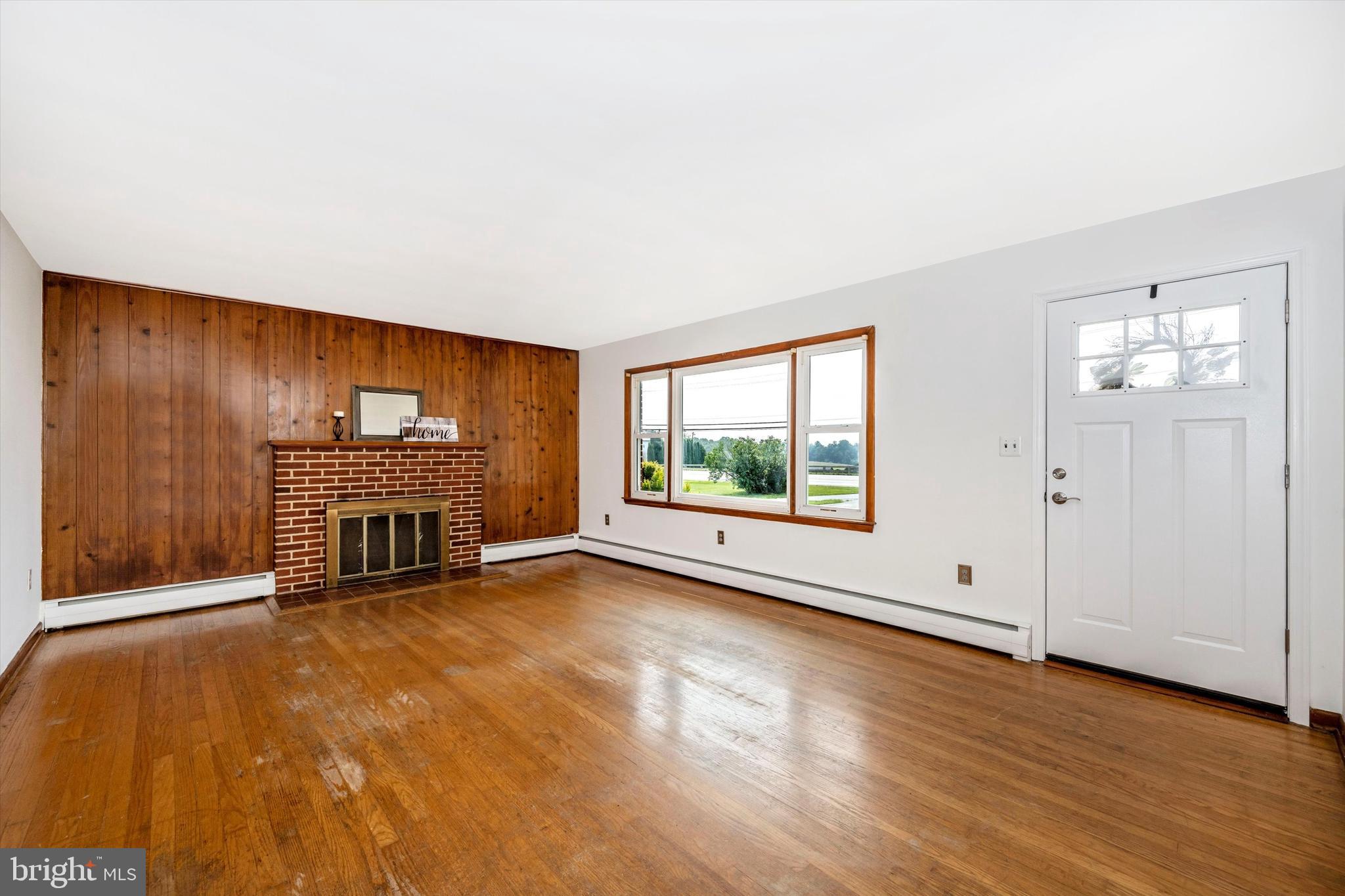 4603 Ridge Road Mount Airy, MD 21771 - Photo 6 of 32 Living Room with Picture Window and Fireplace