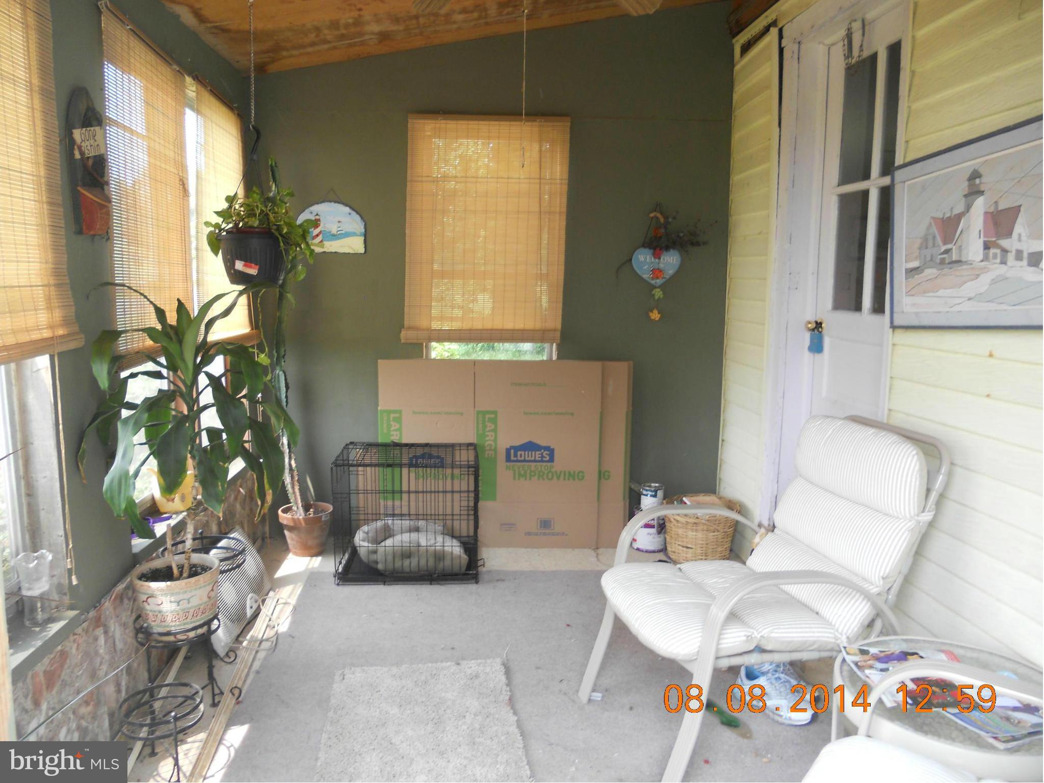 12665 Hog Ridgely, MD 21660 - Photo 2 of 16 Enclosed front porch